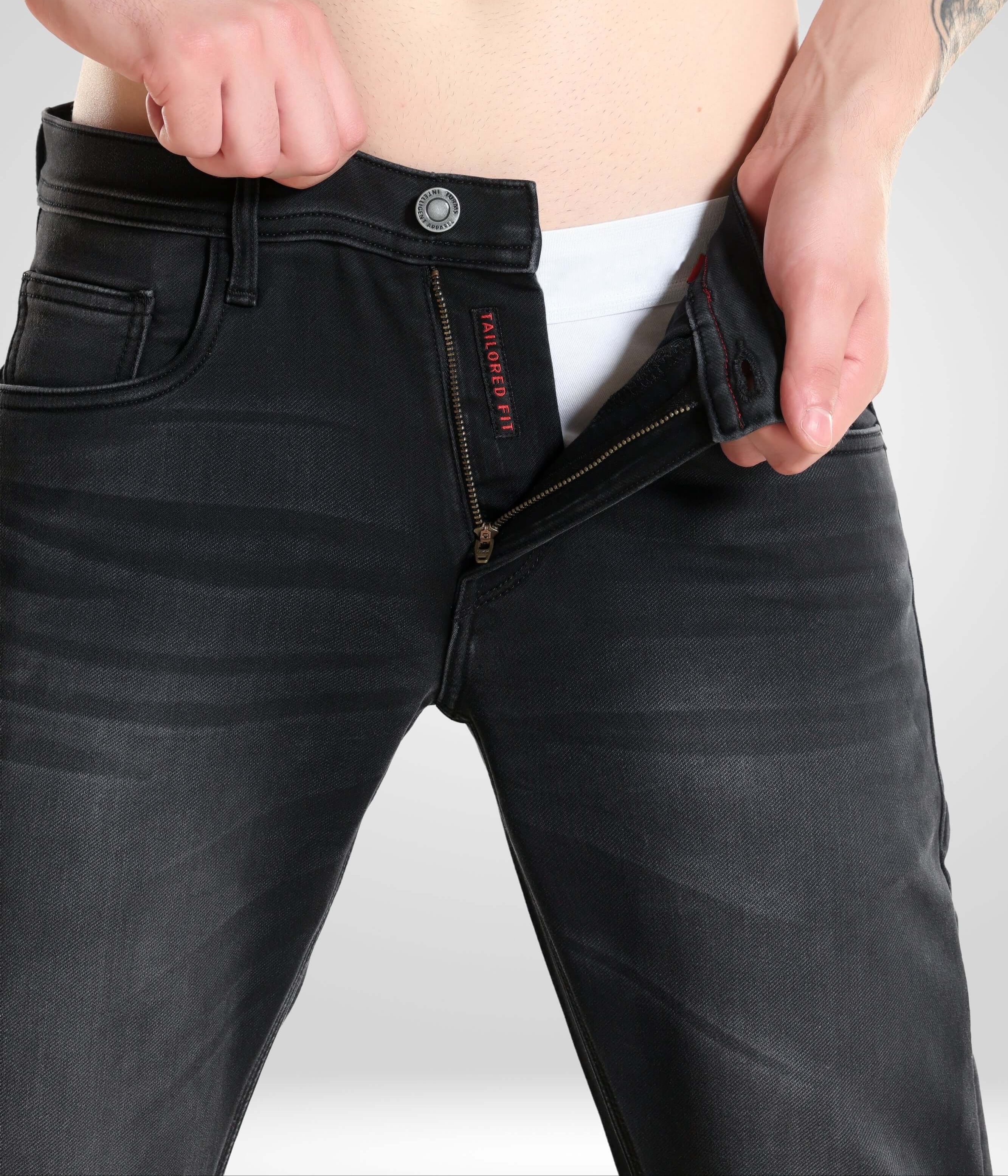 Man wearing Black Sparrow high-performance denim pants, showcasing Turms intelligent apparel in menswear best brand.