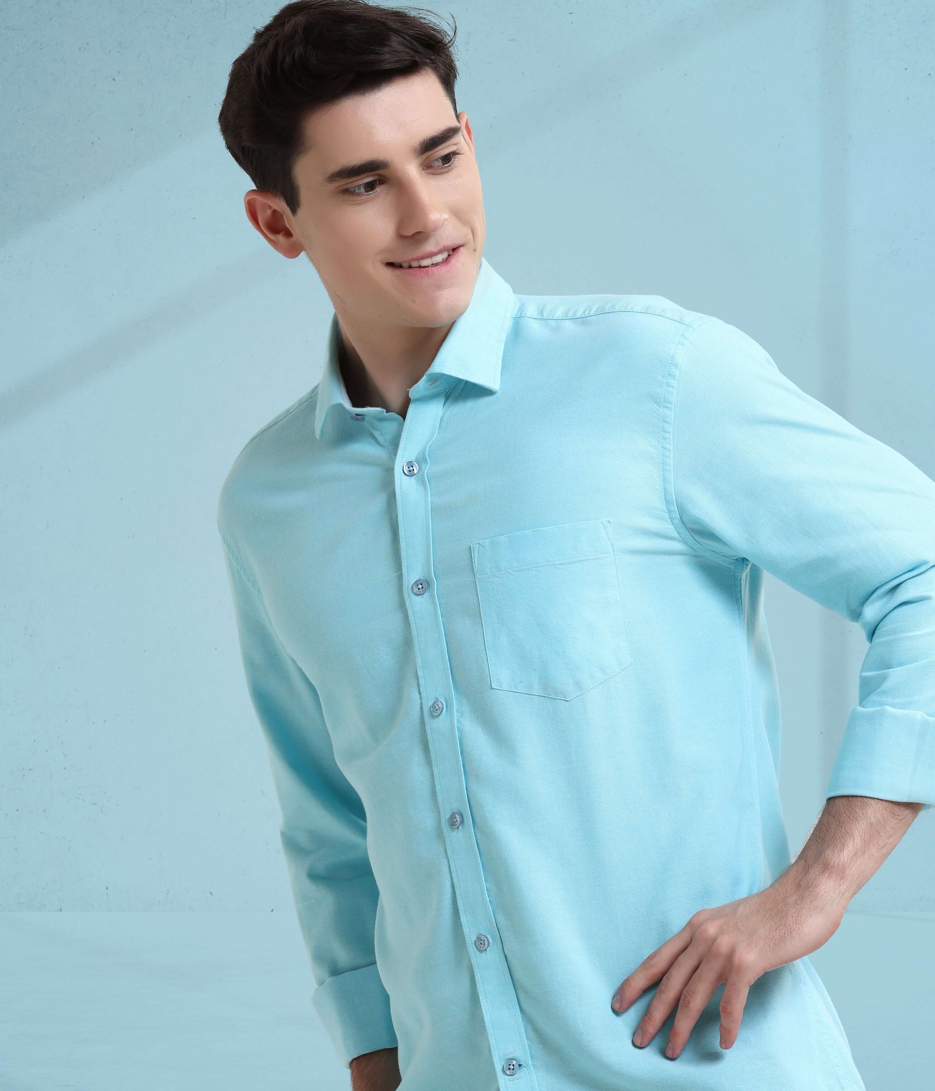 Turquoise Oasis Oxford shirt, a stylish anti-stain, anti-odor, waterproof men's wear for everyday luxury.
