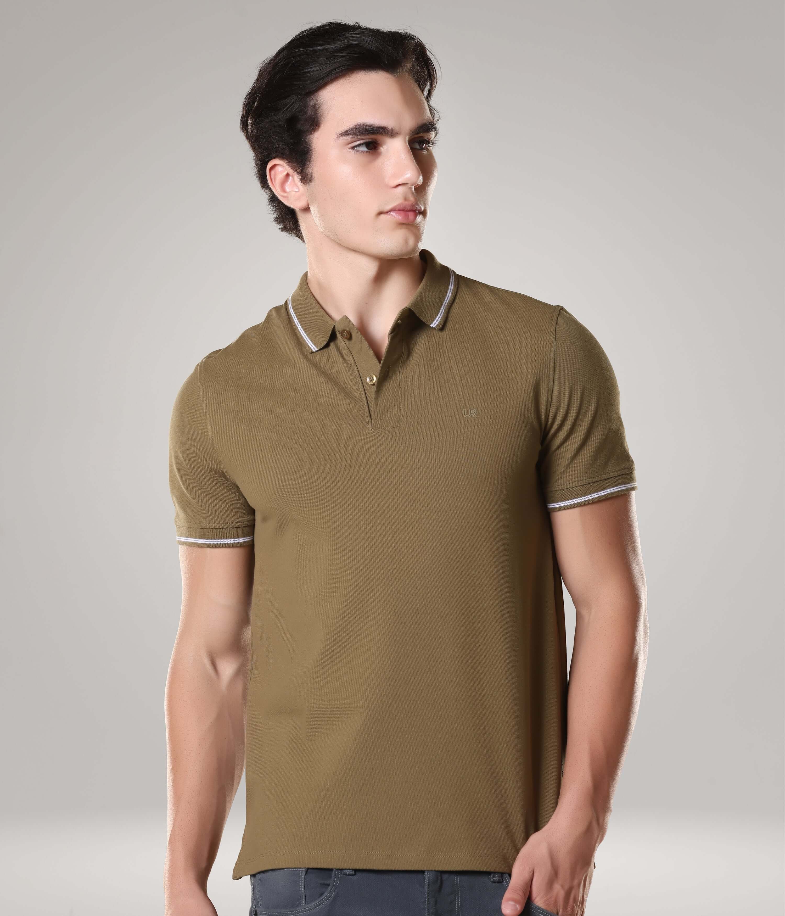 Man wearing Tranquil Green Turms Polo T shirt with tailored fit, anti-stain, anti-odor features, made from premium cotton and lycra.