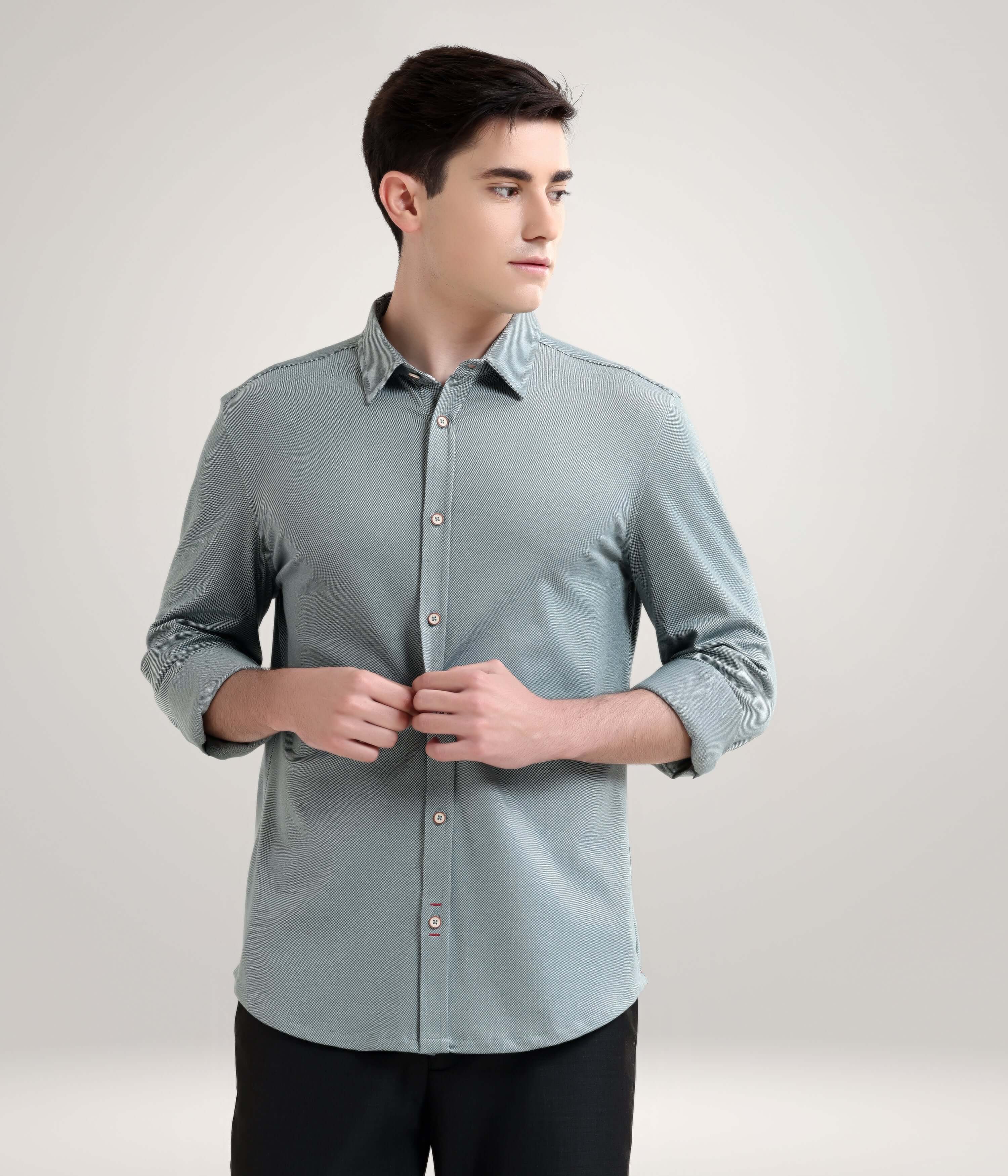 Jadeite Green knitted men's shirt, premium stretchable anti-stain, anti-odour, showcasing style and quality in menswear.