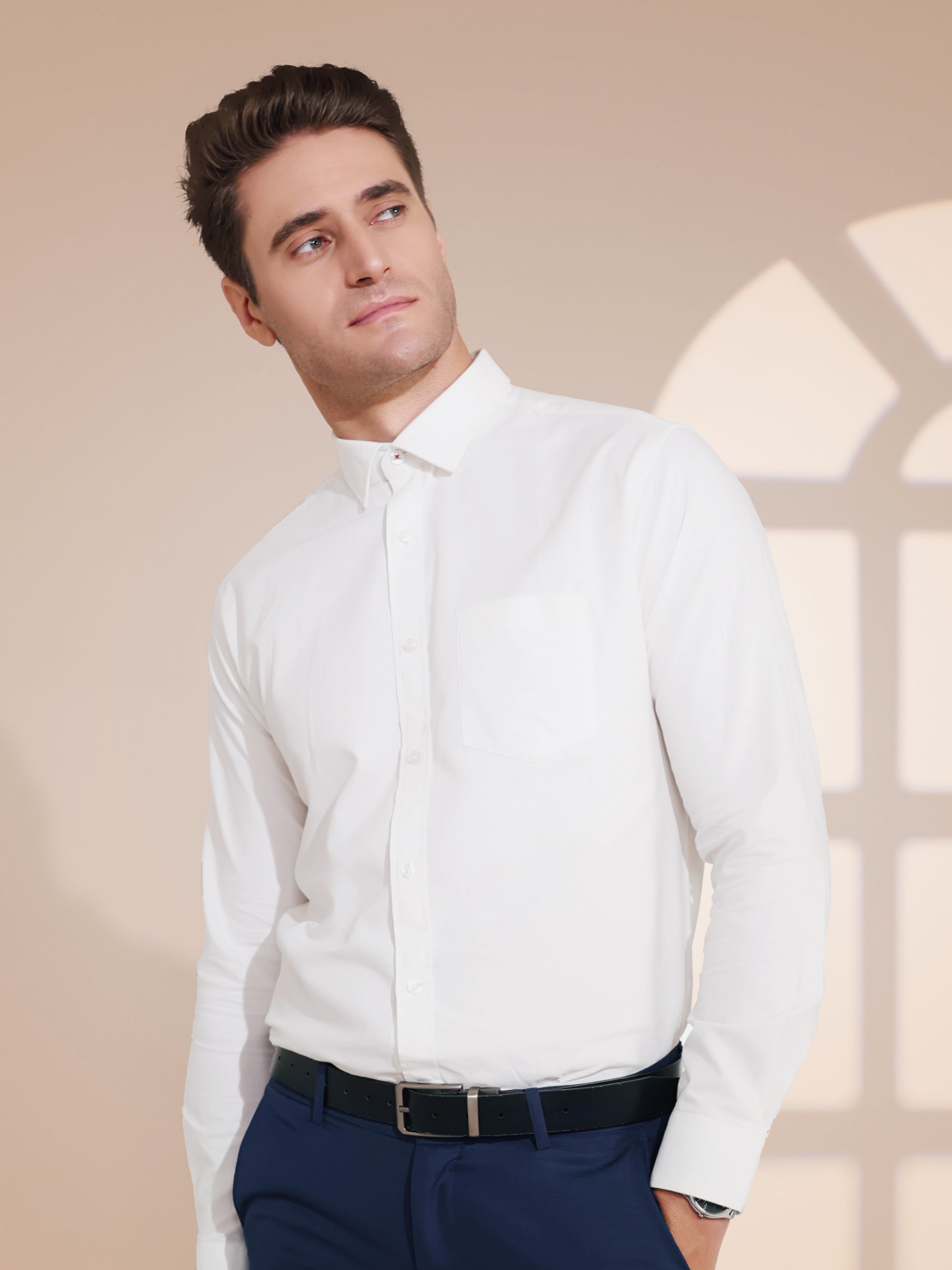 Man wearing Moonlite White Oxford Turms shirt, stylish premium cotton white shirt for men, perfect for casual wear and menswear trends.