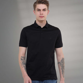 Black mercerized polo T-shirt featuring anti-stain and anti-odor technology for superior everyday wear.