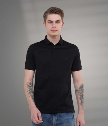 Black mercerized polo T-shirt featuring anti-stain and anti-odor technology for superior everyday wear.