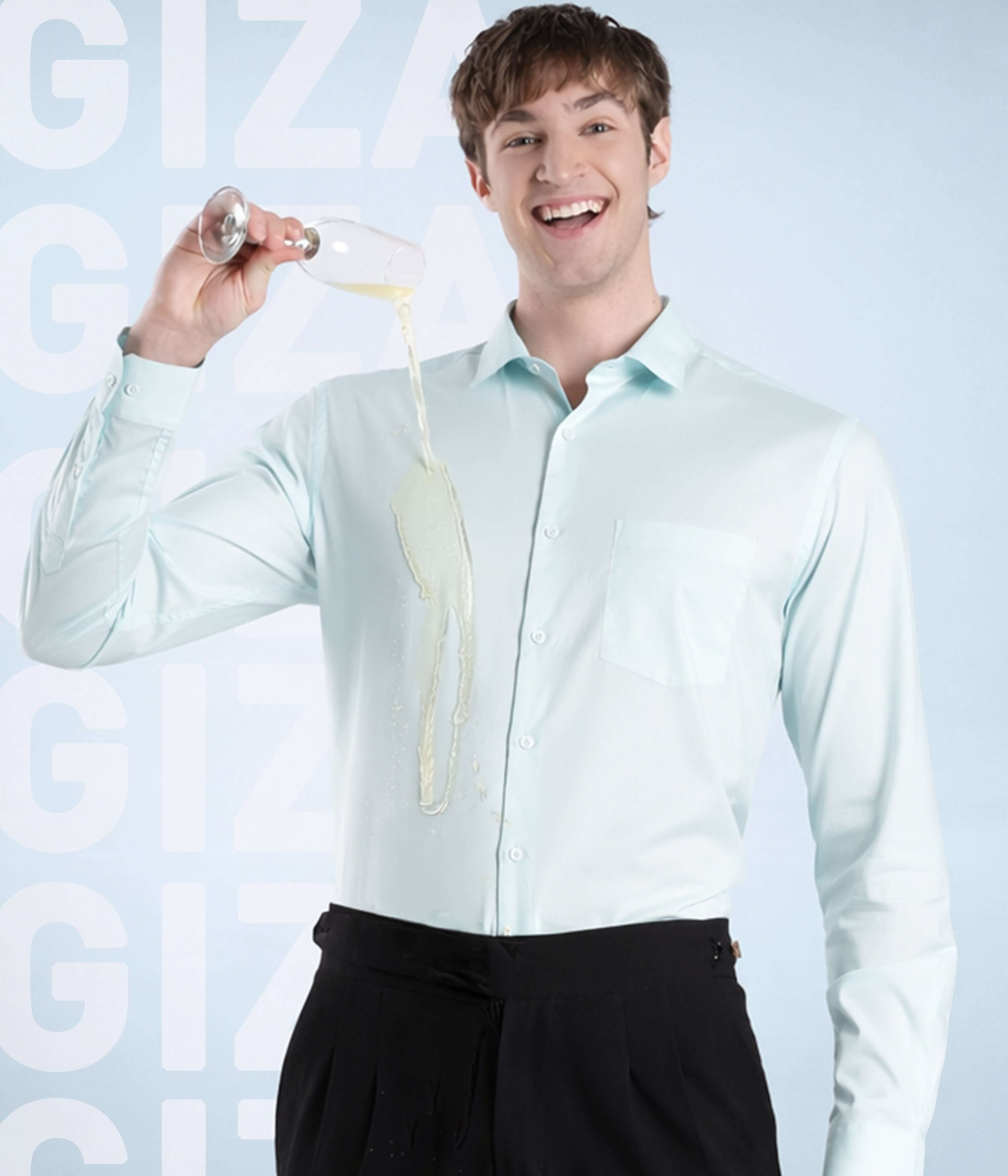 Model wearing Skyblue Luxe shirt, showcasing its style and quality with a drink in hand.