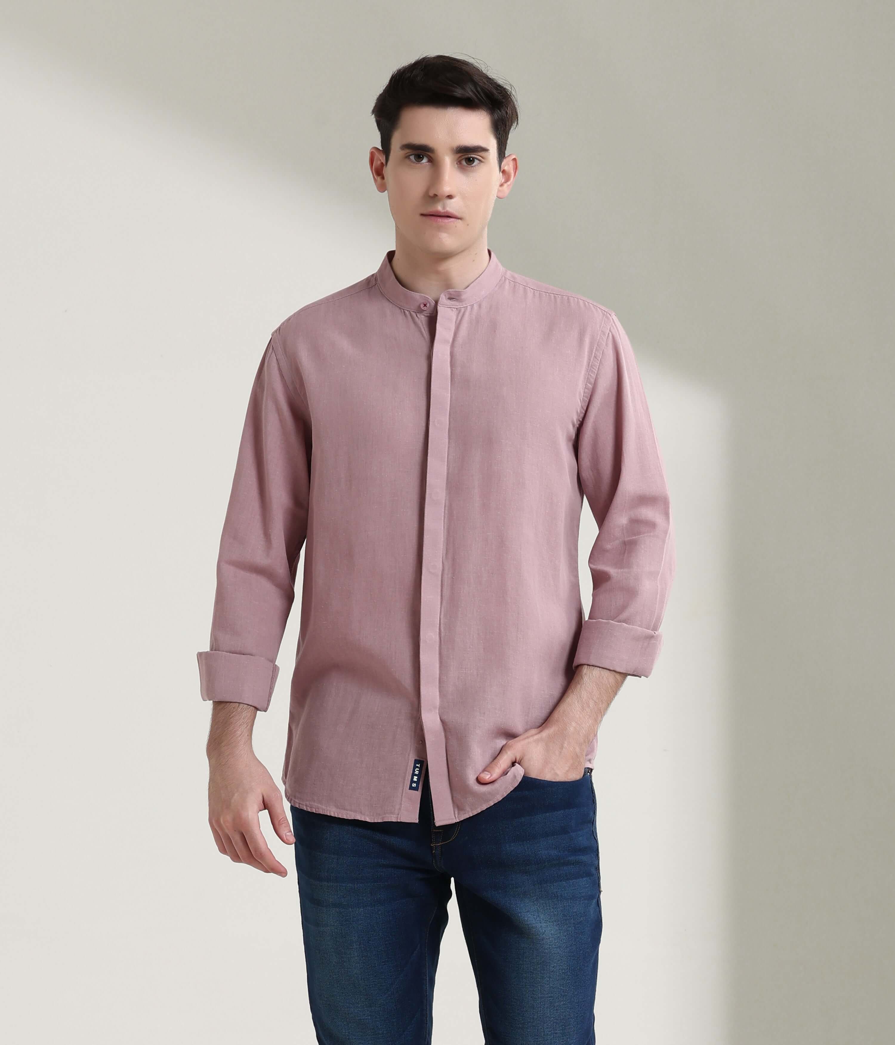 Man wearing a Wood Rose Turms linen shirt with mandarin collar, featuring anti-stain and anti-odour intelligent apparel technology.