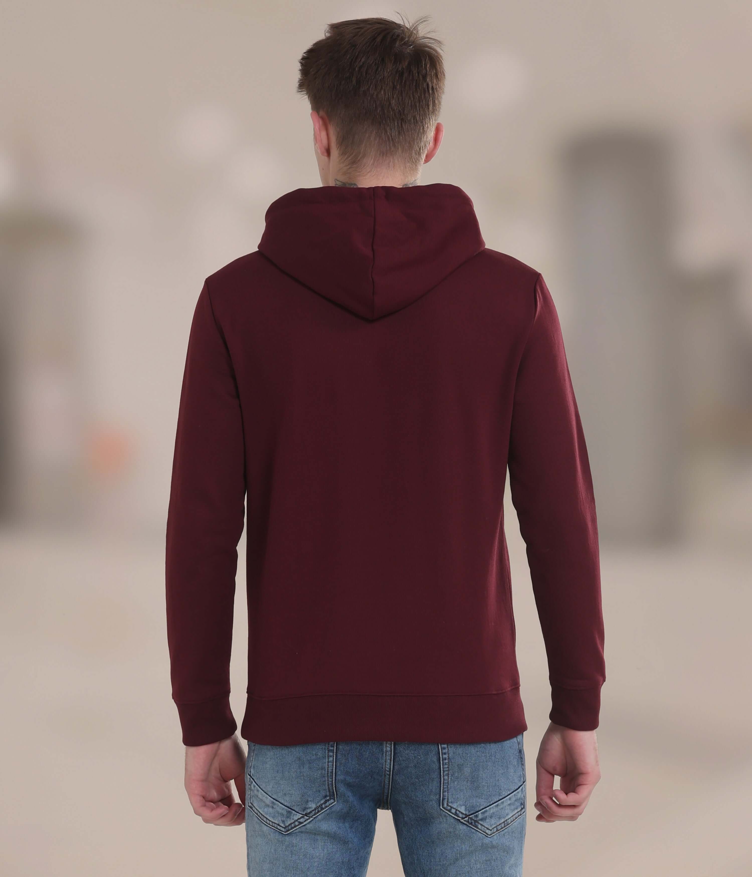 Back view of a maroon hooded sweatshirt showcasing its stylish design and comfortable fit, perfect for everyday wear.