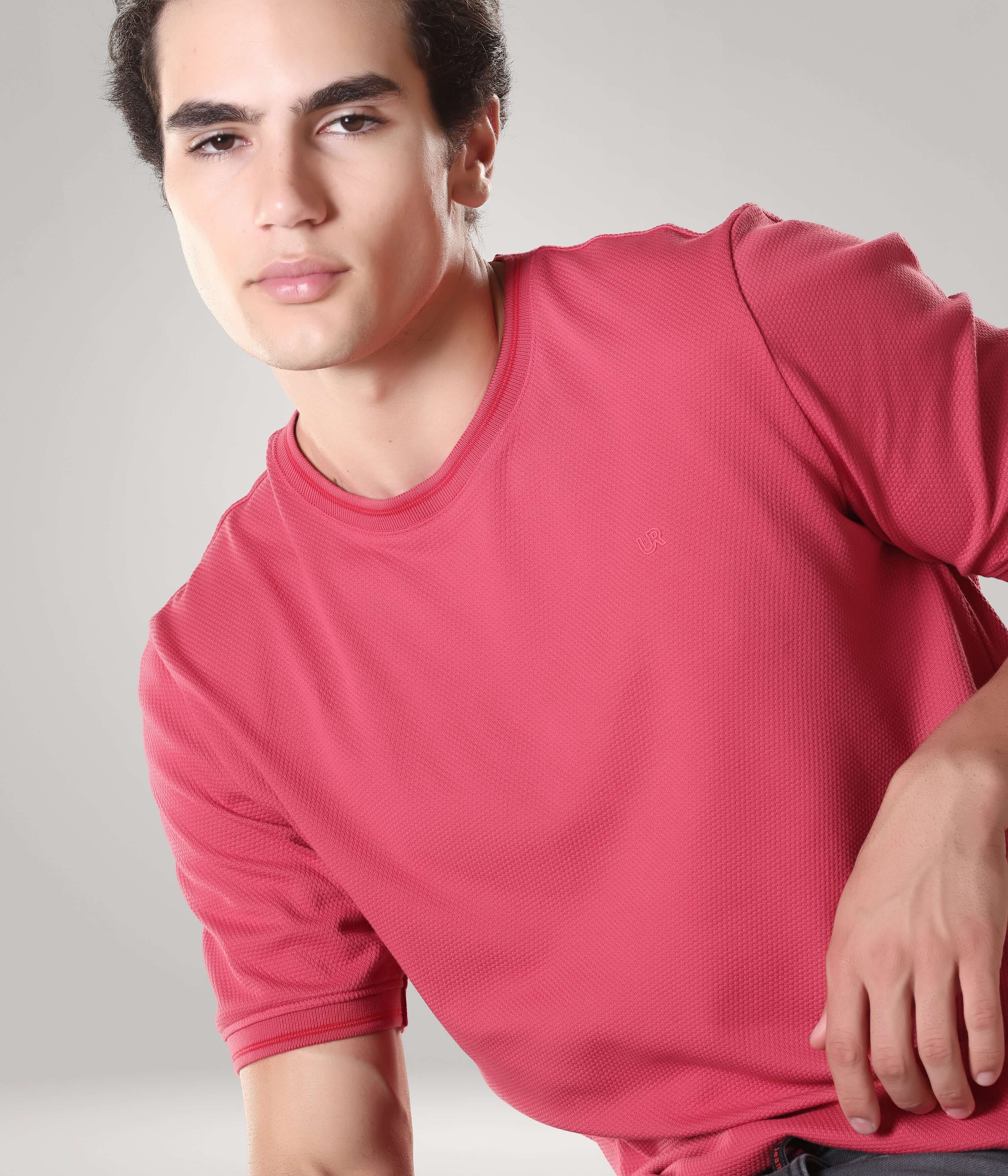 Man wearing Regal Pink Turms T-shirt made of premium cotton blend for cool and comfortable fit