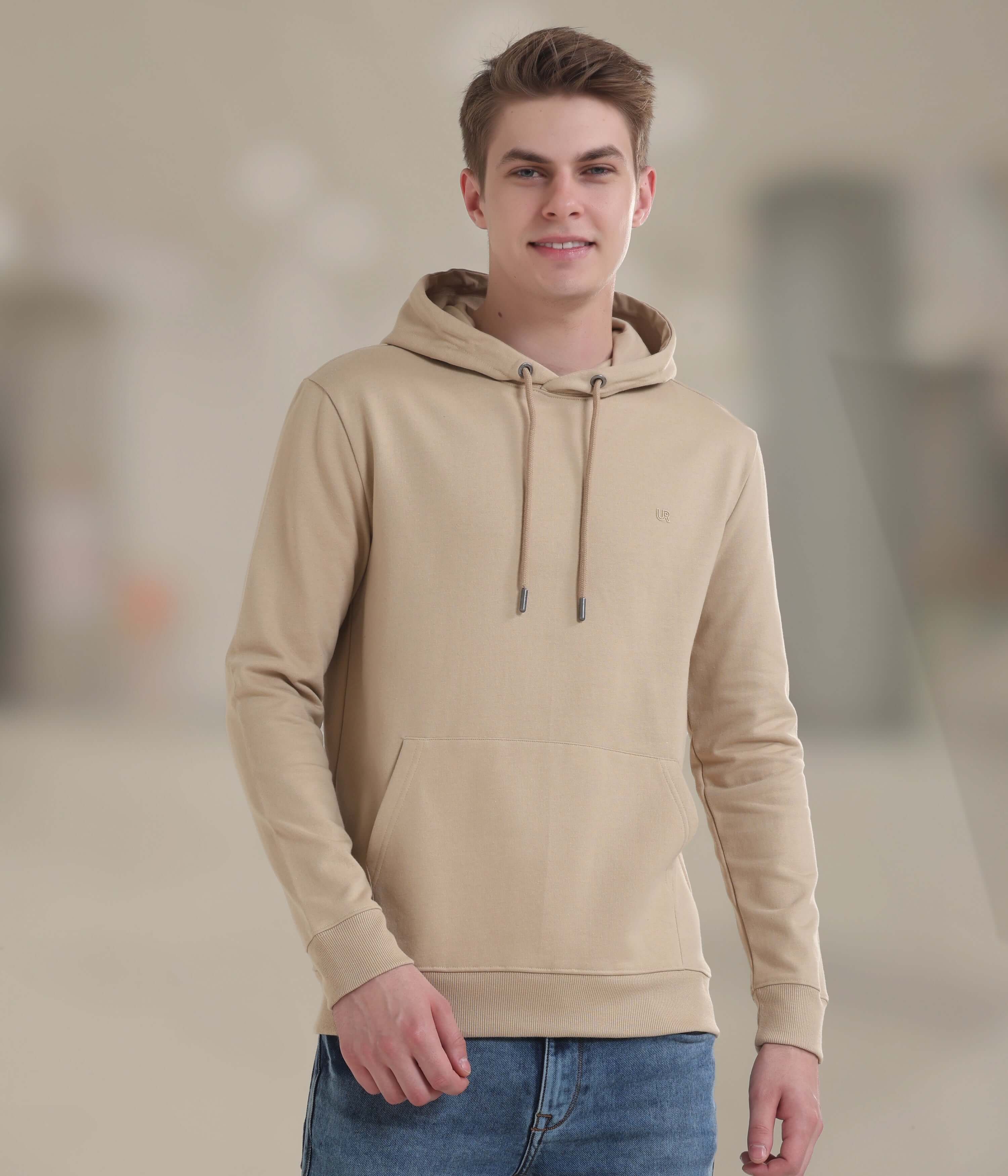 Stylish beige hooded sweatshirt for men, combining comfort with waterproof and stain-proof features. Ideal for everyday wear.