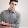 Men's premium grey knitted shirt, stretchable and anti-stain, ideal for stylish and functional menswear.