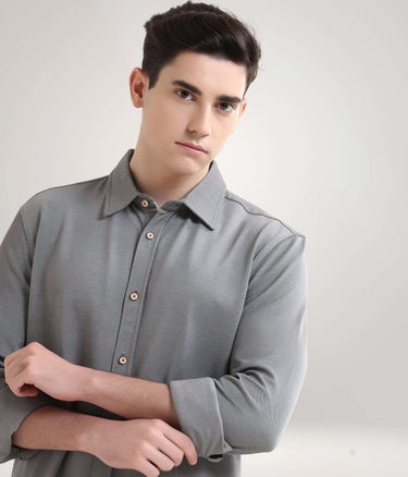 Men's premium grey knitted shirt, stretchable and anti-stain, ideal for stylish and functional menswear.
