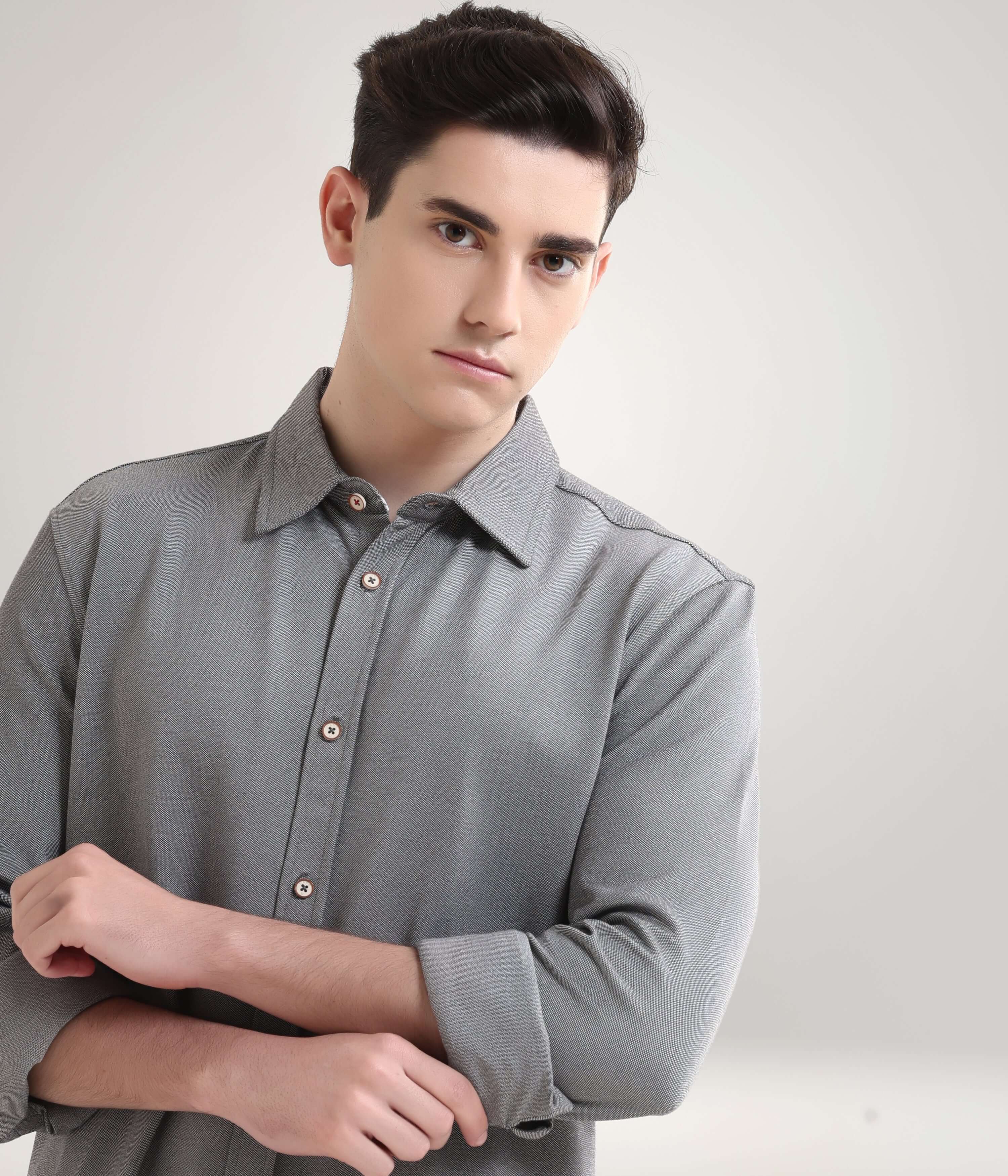 Men's premium grey knitted shirt, stretchable and anti-stain, ideal for stylish and functional menswear.