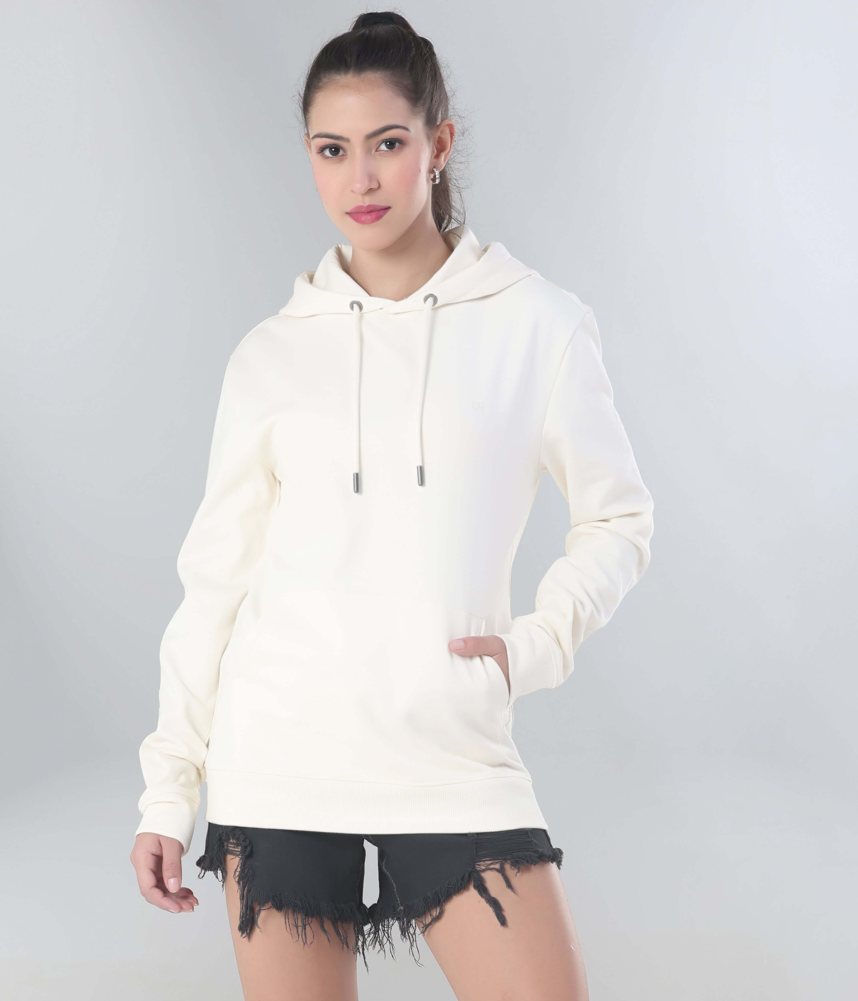 Best women’s hoodie in cream, featuring Turms Intelligent anti-stain, anti-odor, water-resistant fabric for stylish travel wear.