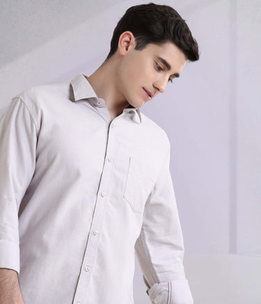 Pepple Haze Oxford turms shirt in light grey, showcasing anti-stain, anti-odour, and waterproof features for men's wear.