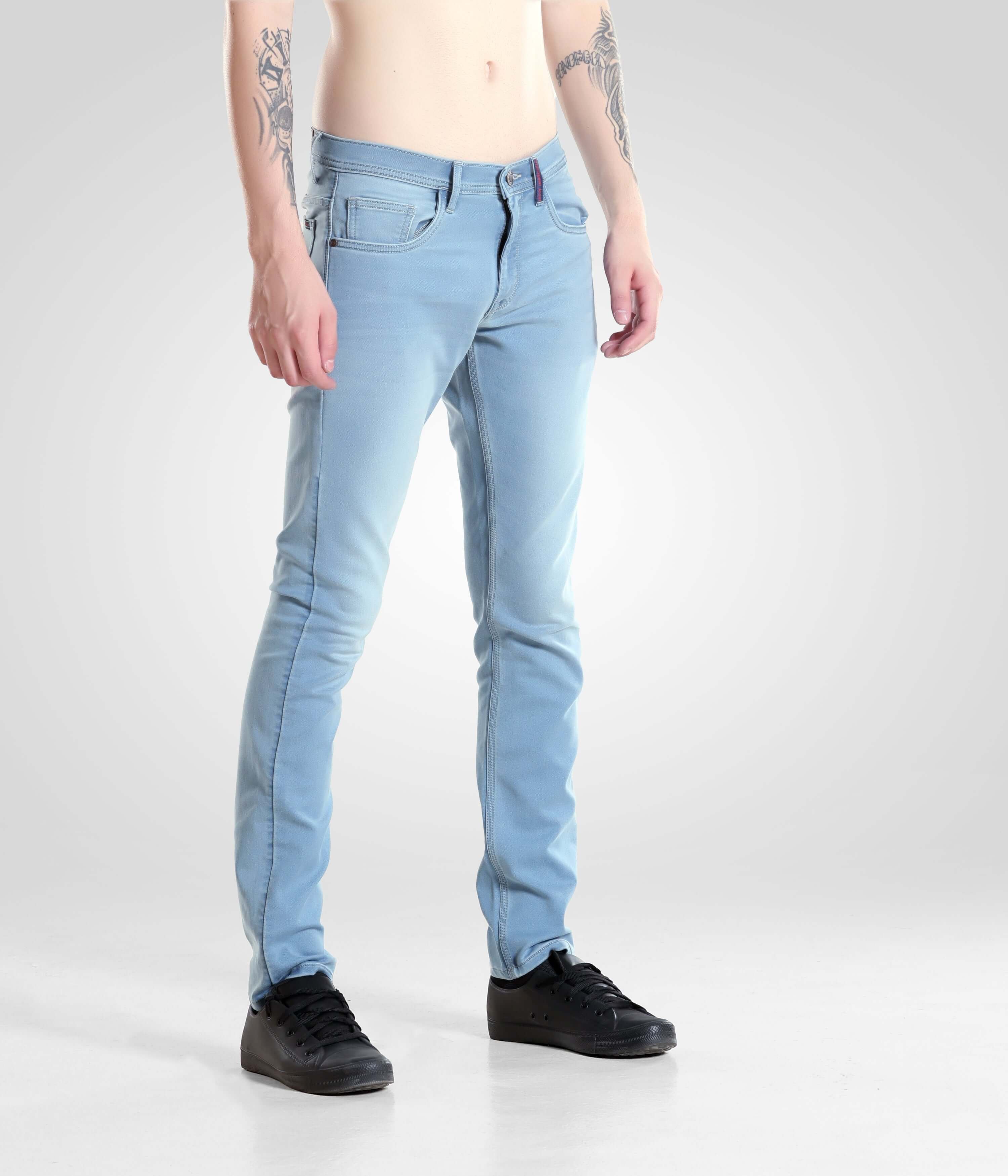 Light blue Quantum Blue denim pants from Turms Intelligent Apparel showcasing high-performance menswear fashion.