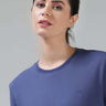 Woman wearing Blooming Orchid Turms coolant round-neck T-shirt in new colour with COOLTECH, anti-odour honeycomb fabric - intelligent apparel.