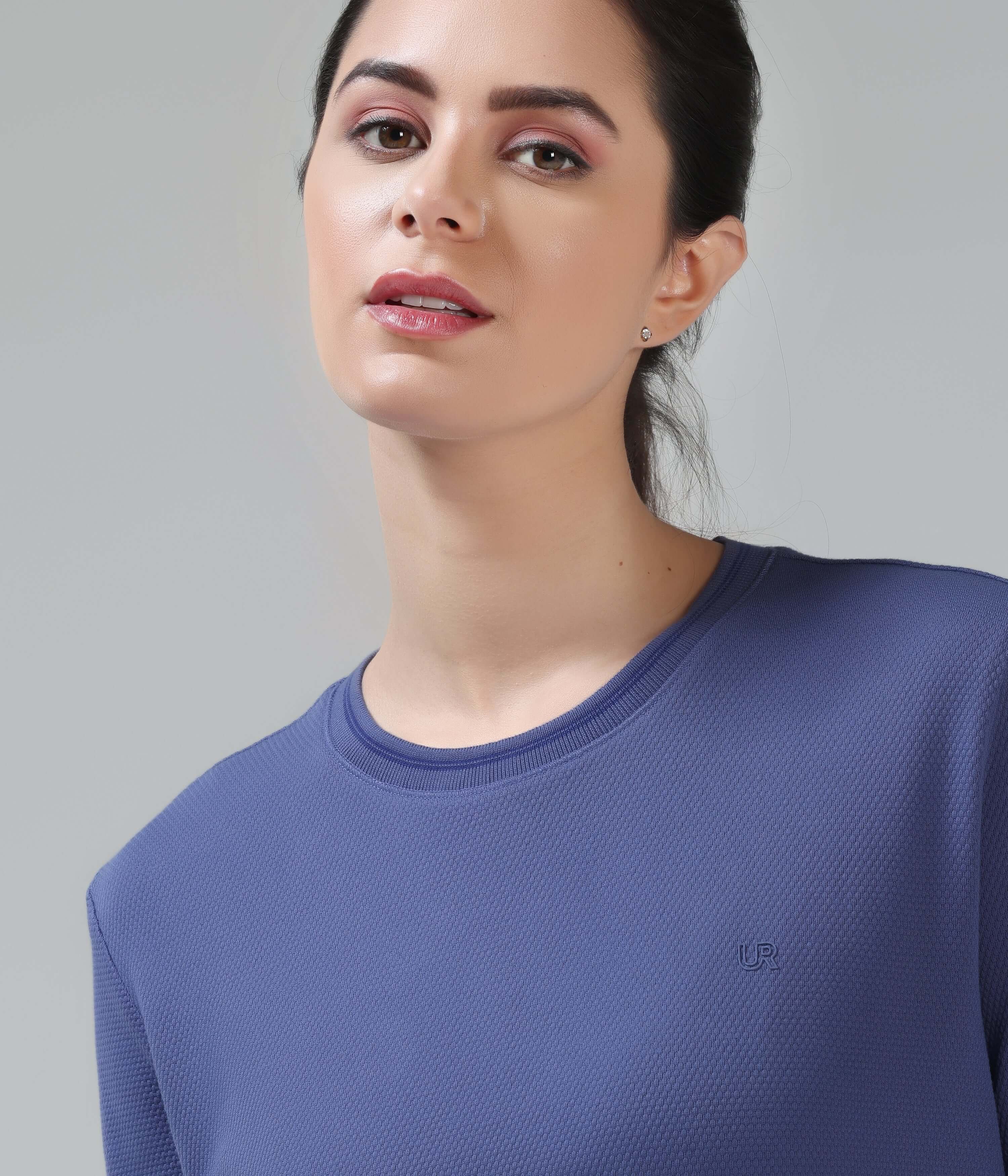 Woman wearing Blooming Orchid Turms coolant round-neck T-shirt in new colour with COOLTECH, anti-odour honeycomb fabric - intelligent apparel.