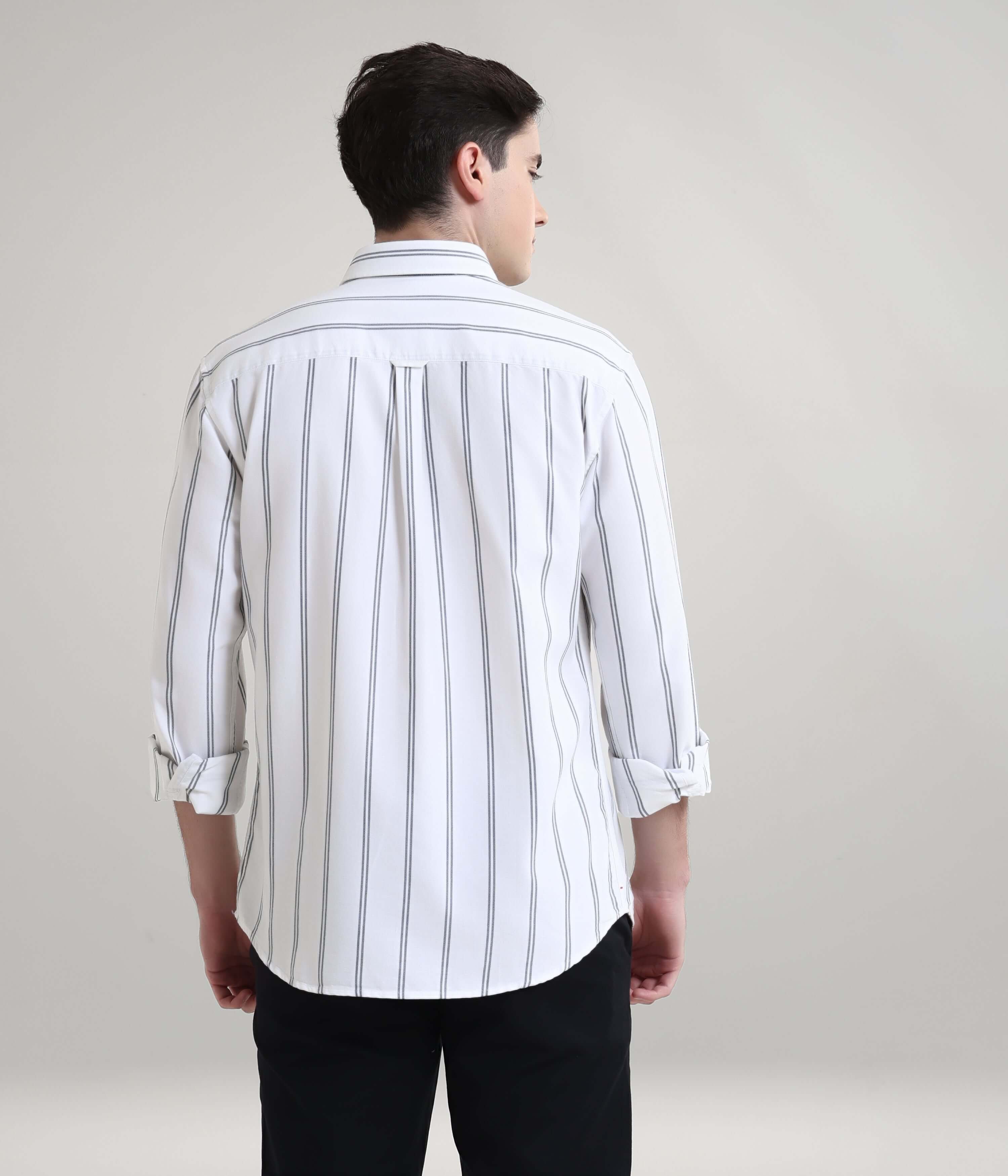 Man wearing Colada White striped Oxford Turms shirt, premium menswear with anti-stain and anti-odour features.