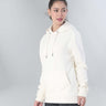 Woman in cream Turms Intelligent Hooded Sweatshirt, best for travel wear, featuring anti-stain and water-resistant properties.
