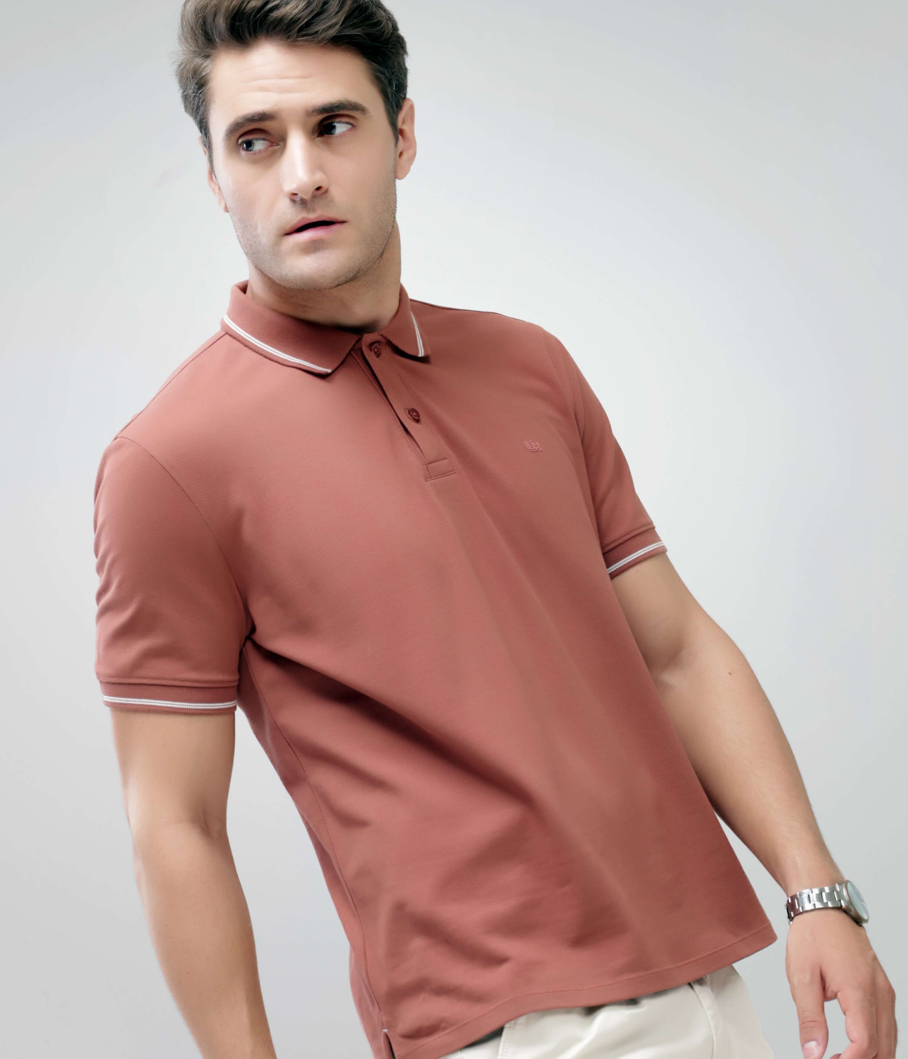 Man wearing Luxe Cocoa Turms intelligent apparel anti-stain, anti-odour premium cotton polo t-shirt, tailored fit.