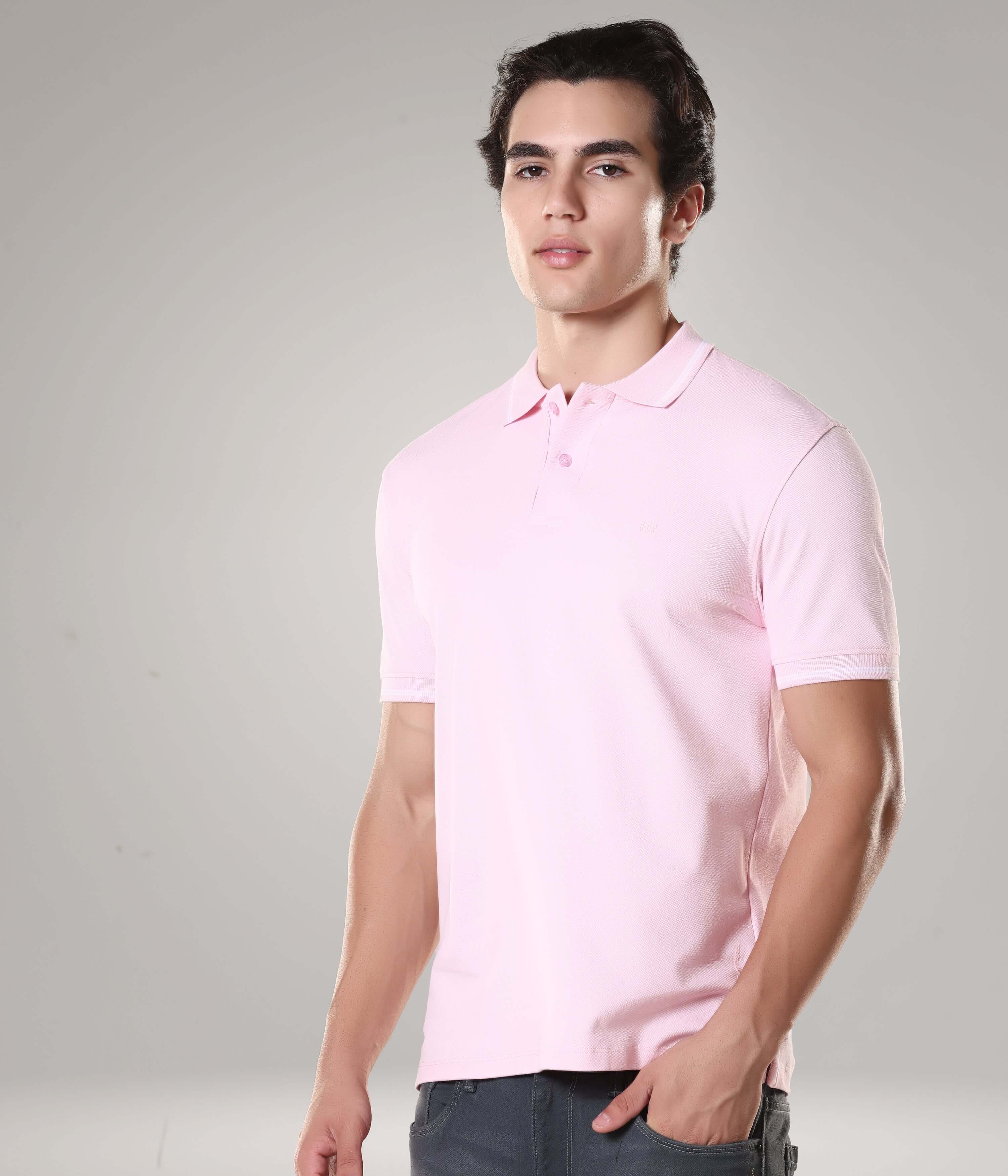 Man wearing a pink Turms Polo T-shirt, made with premium cotton and spandex, featuring anti-stain and anti-odor intelligent apparel technology.