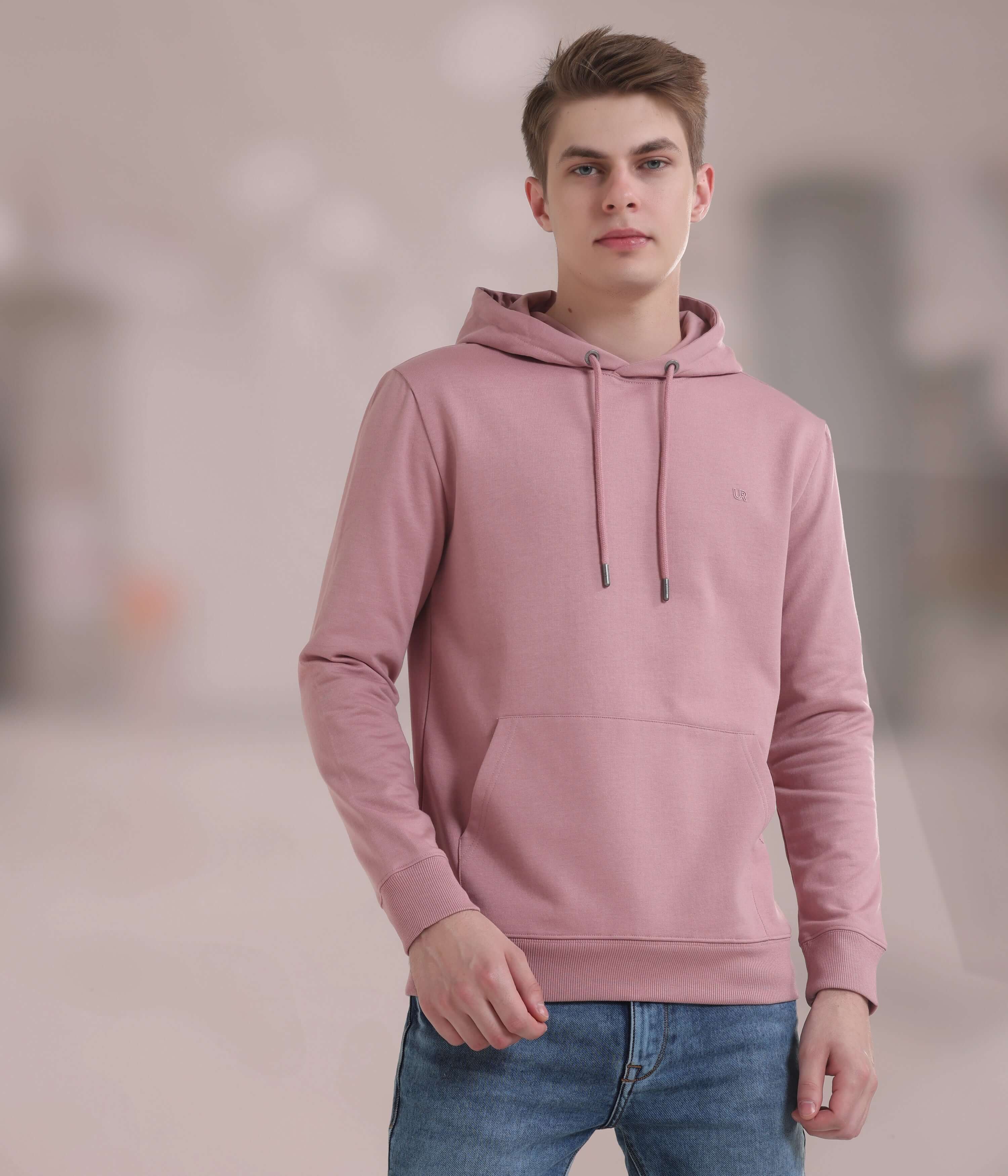 Stylish pink hooded sweatshirt for men, crafted from soft, durable fabric, perfect for everyday wear and comfort.