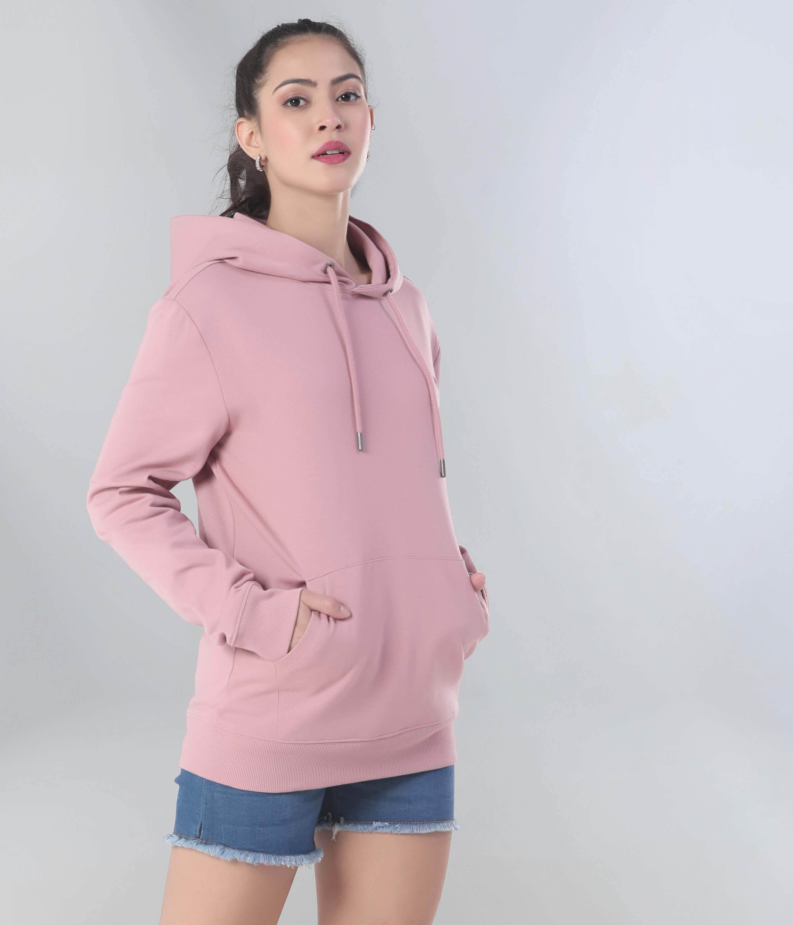 Pink hooded sweatshirt for women, showcasing style, comfort, and travel wear functionality. Best for everyday use.