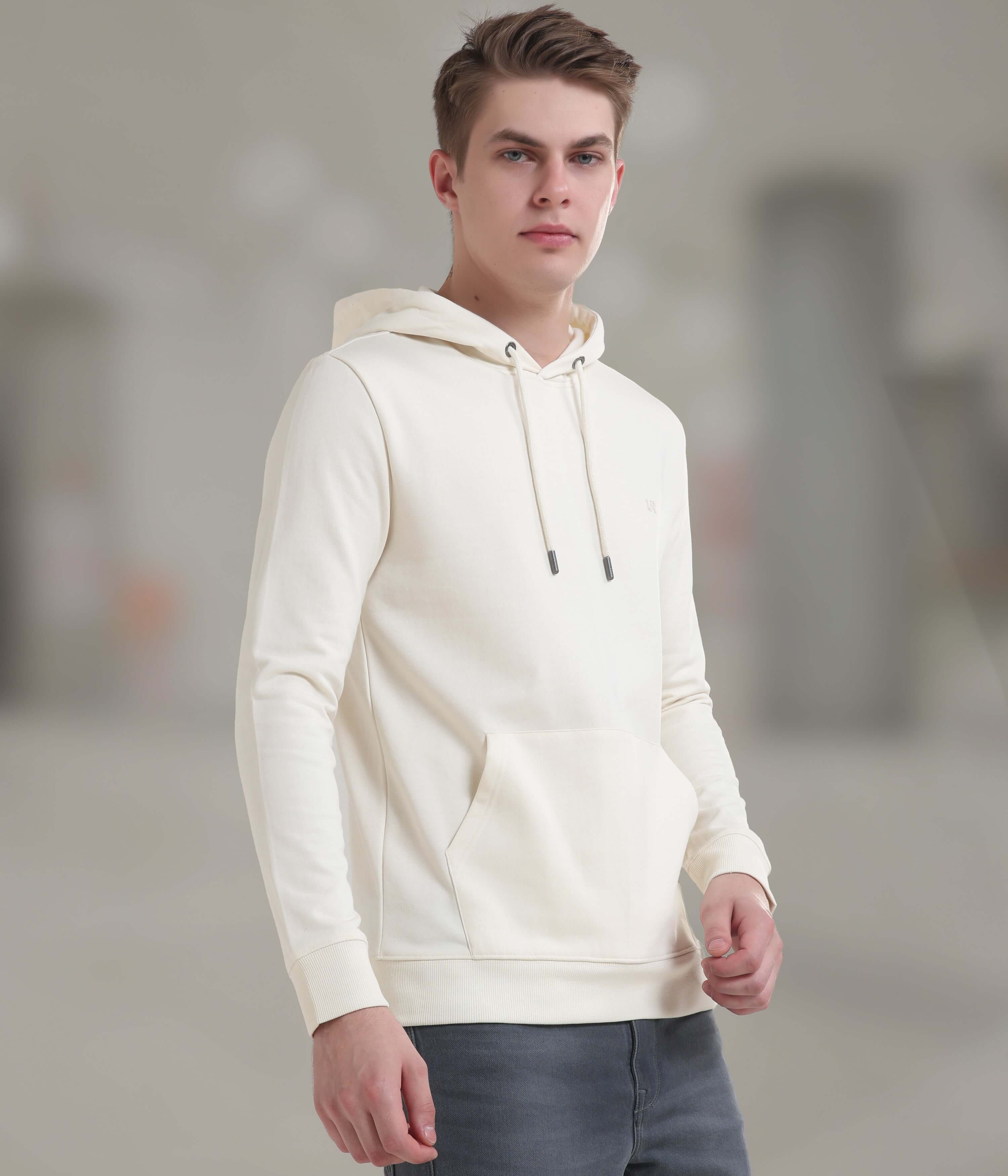 Stylish ivory hooded sweatshirt, soft and breathable, ideal for everyday wear and featuring a vintage-inspired design.