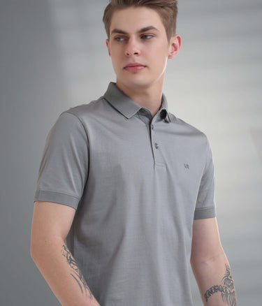 Grey polo t-shirt, stain-proof and odor-resistant, showcasing tailored fit and premium cotton blend fabric.