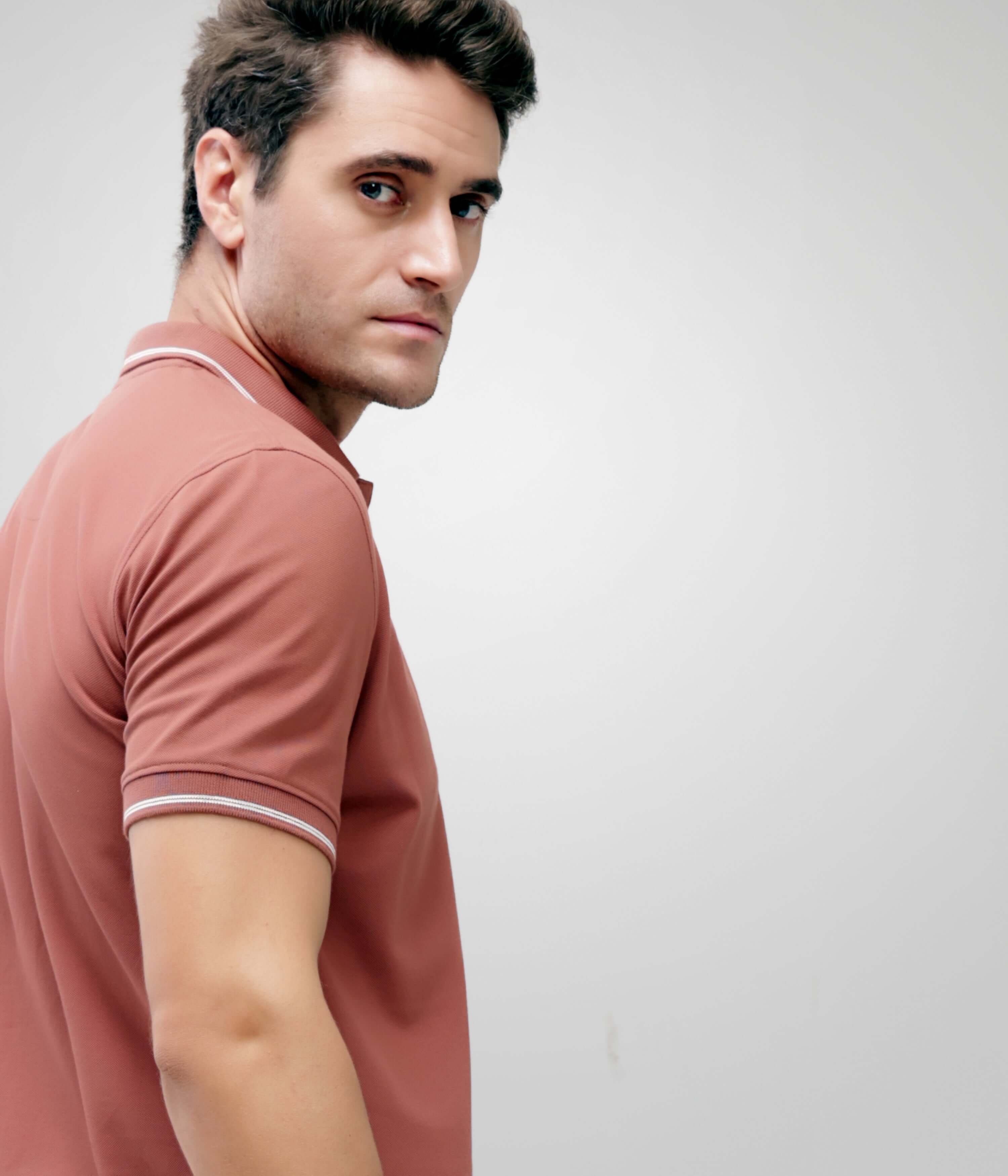 Luxe Cocoa Turms Polo T-shirt on man, showcasing tailored fit and premium cotton blend with stain-proof, anti-odor intelligent apparel features.