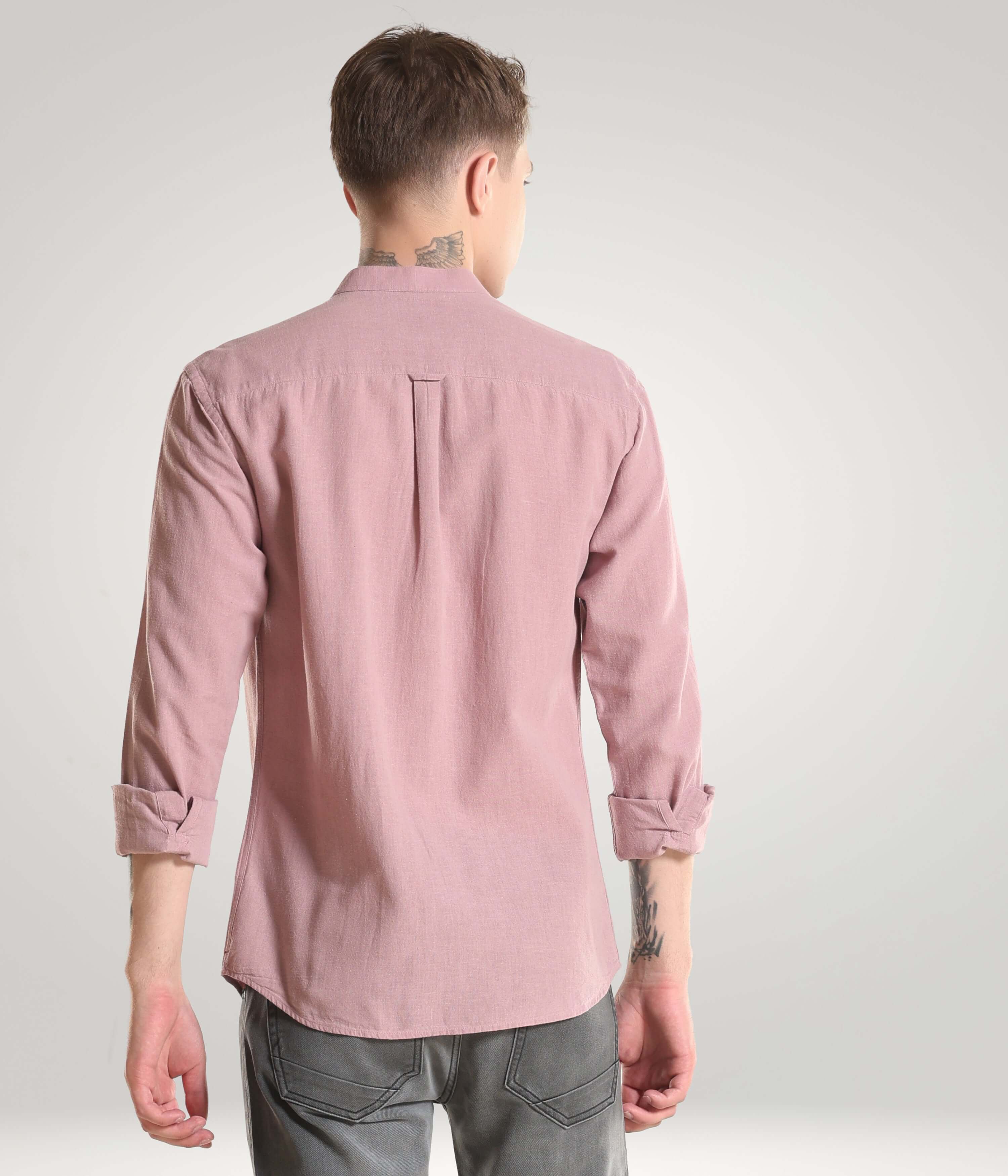 Back view of man wearing Wood Rose Turms shirt made of premium cotton and linen blend with mandarin collar, showcasing meticulous stitching.