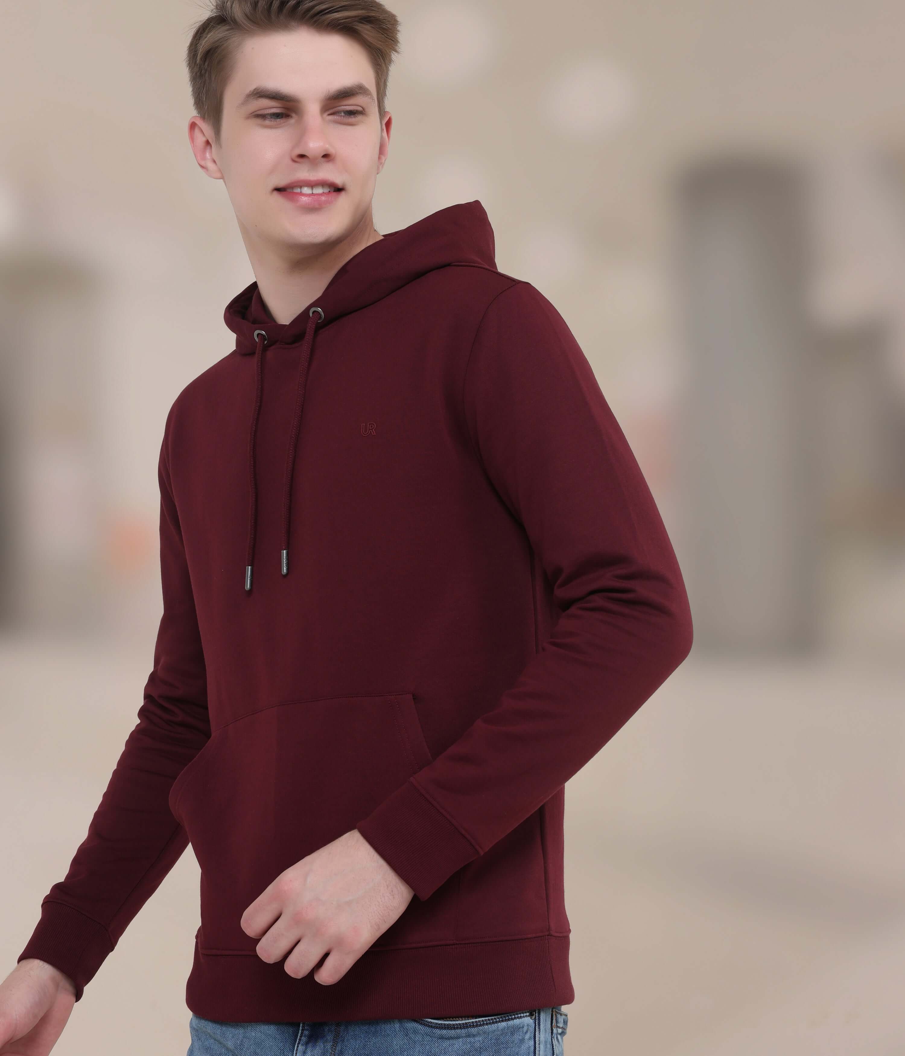 Stylish maroon hooded sweatshirt for men, featuring durable, breathable fabric and a modern, sporty design.