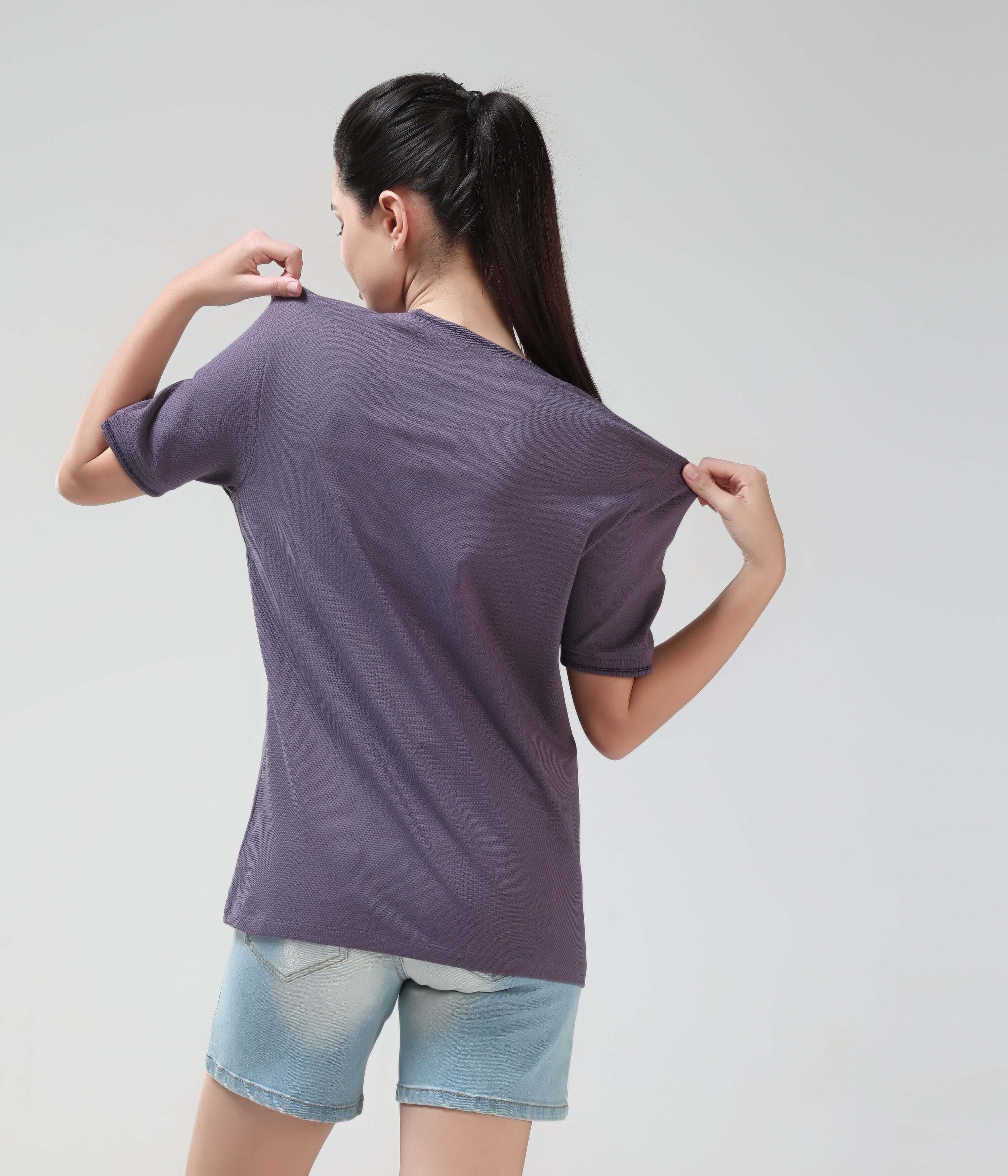 Woman wearing Mulberry Dynasty CoolTech T-Shirt with anti-odour honeycomb fabric, demonstrating the new color and comfortable tailored fit.