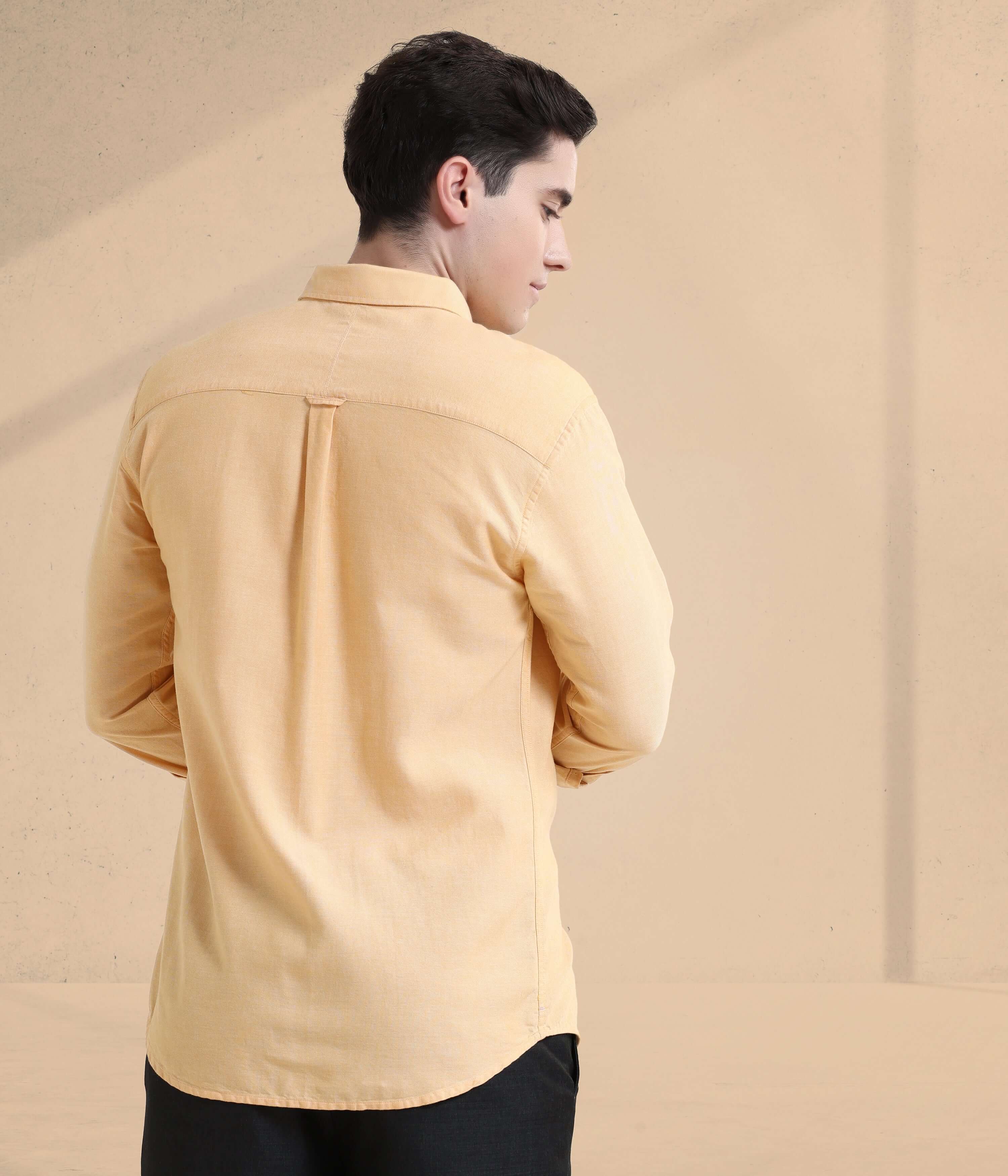 Yellow Oxford Turms shirt for men, featuring anti-stain and waterproof properties, perfect for everyday luxury wear.