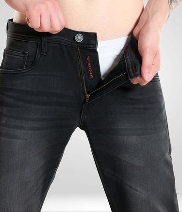 Man wearing Black Sparrow high-performance denim pants, showcasing Turms intelligent apparel in menswear best brand.