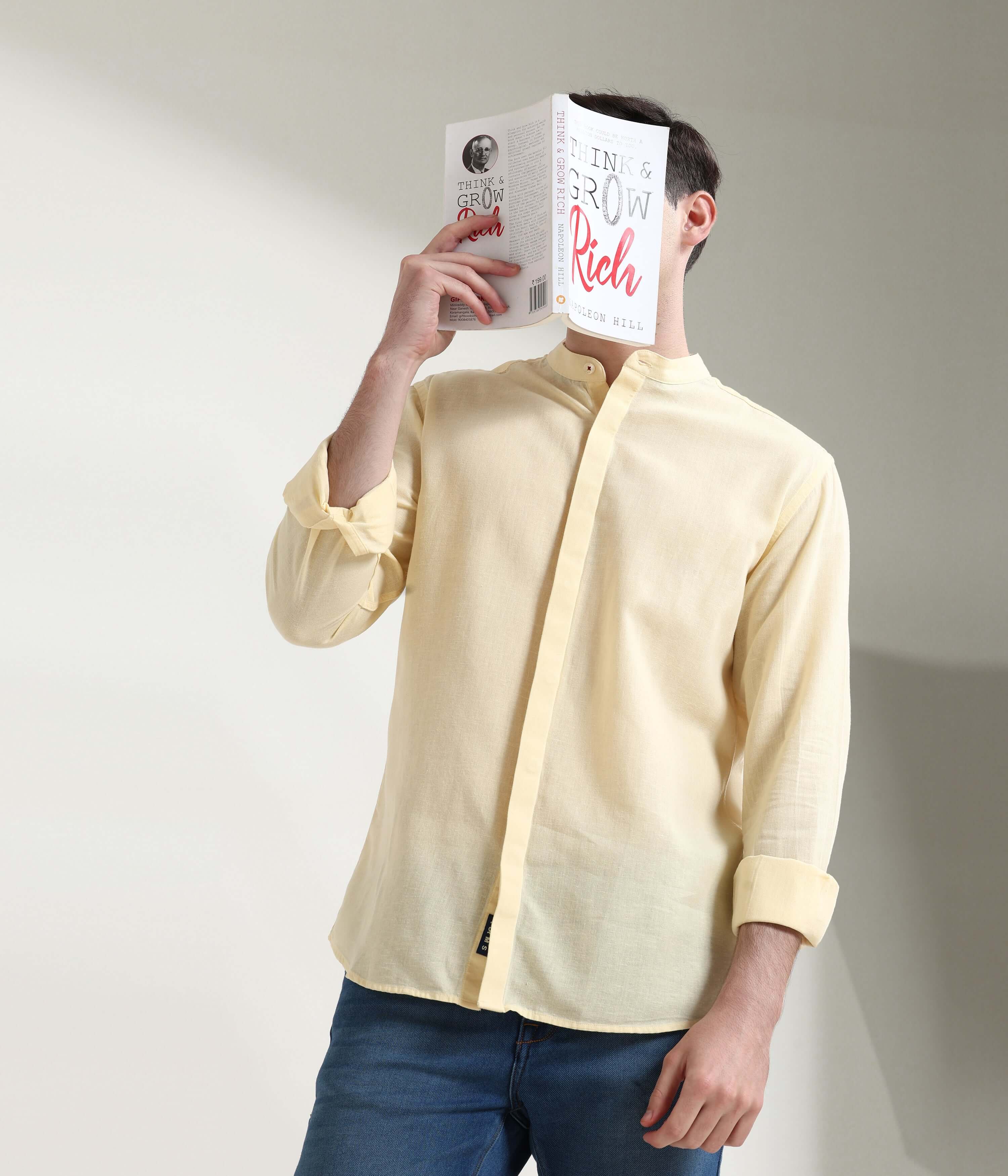 Pastel yellow linen shirt with mandarin collar, showcasing anti-stain and anti-odour Turms intelligent apparel features.