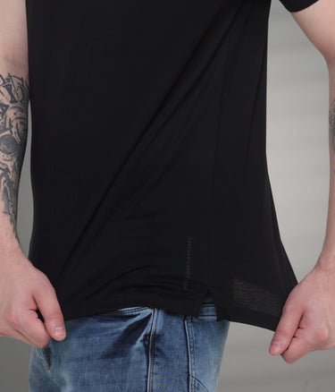 Black Turms Polo T-shirt showcasing tailored fit and premium fabric, designed for stain-proof and odor-resistant protection.