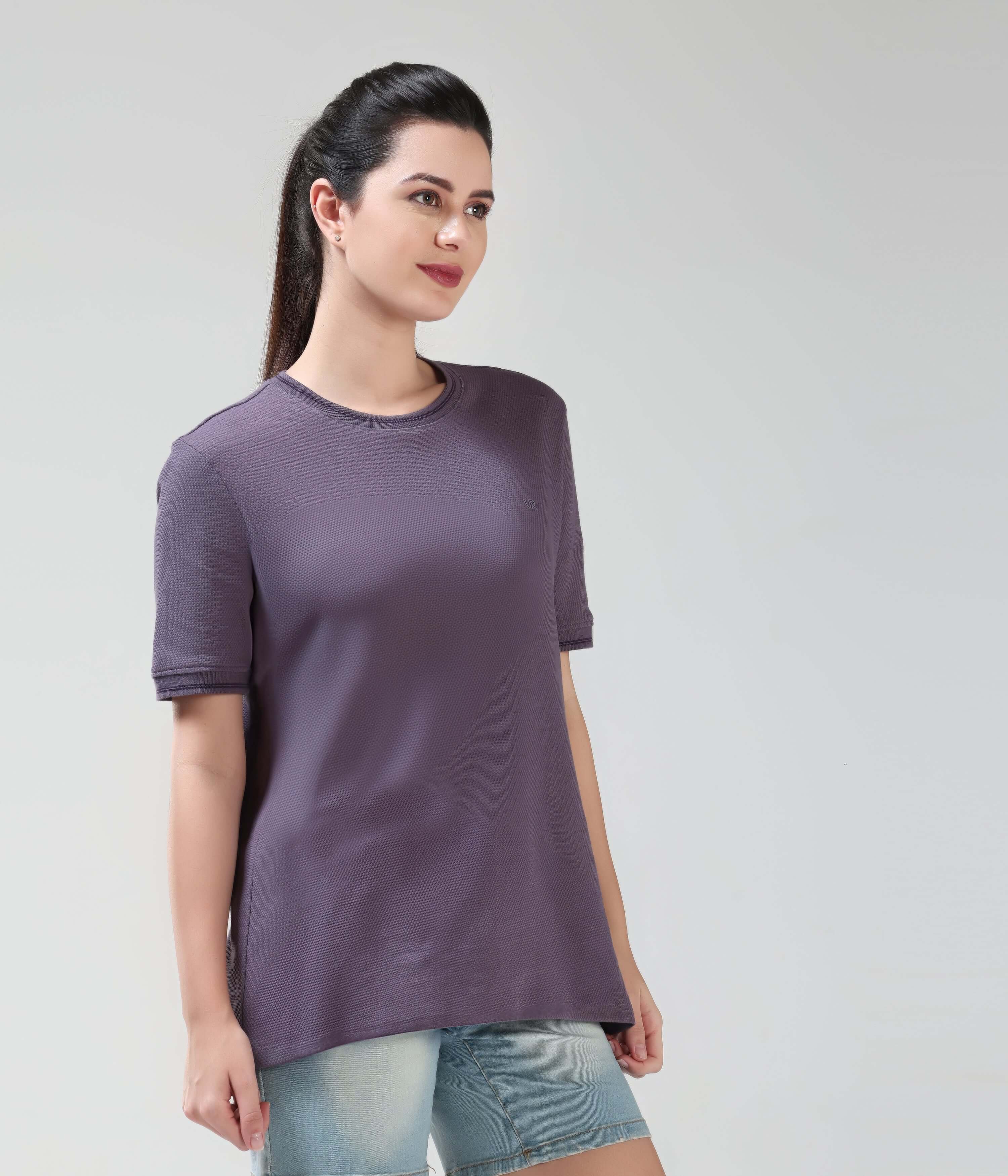 Woman wearing Mulberry Dynasty COOLTECH T-shirt by Turms, featuring honeycomb fabric and anti-odour properties in a new colour.