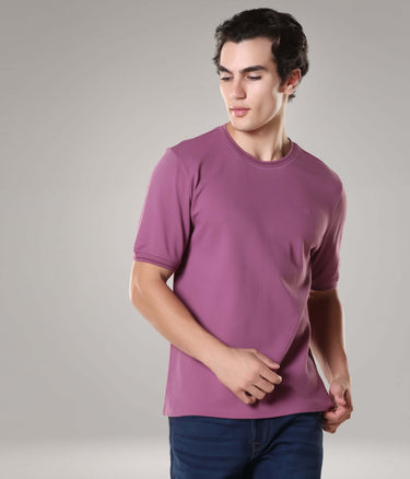 Man wearing Dusty Rose Turms T-shirt made of premium cotton blend with cooltech and anti-microbial features for cool and comfortable everyday wear.