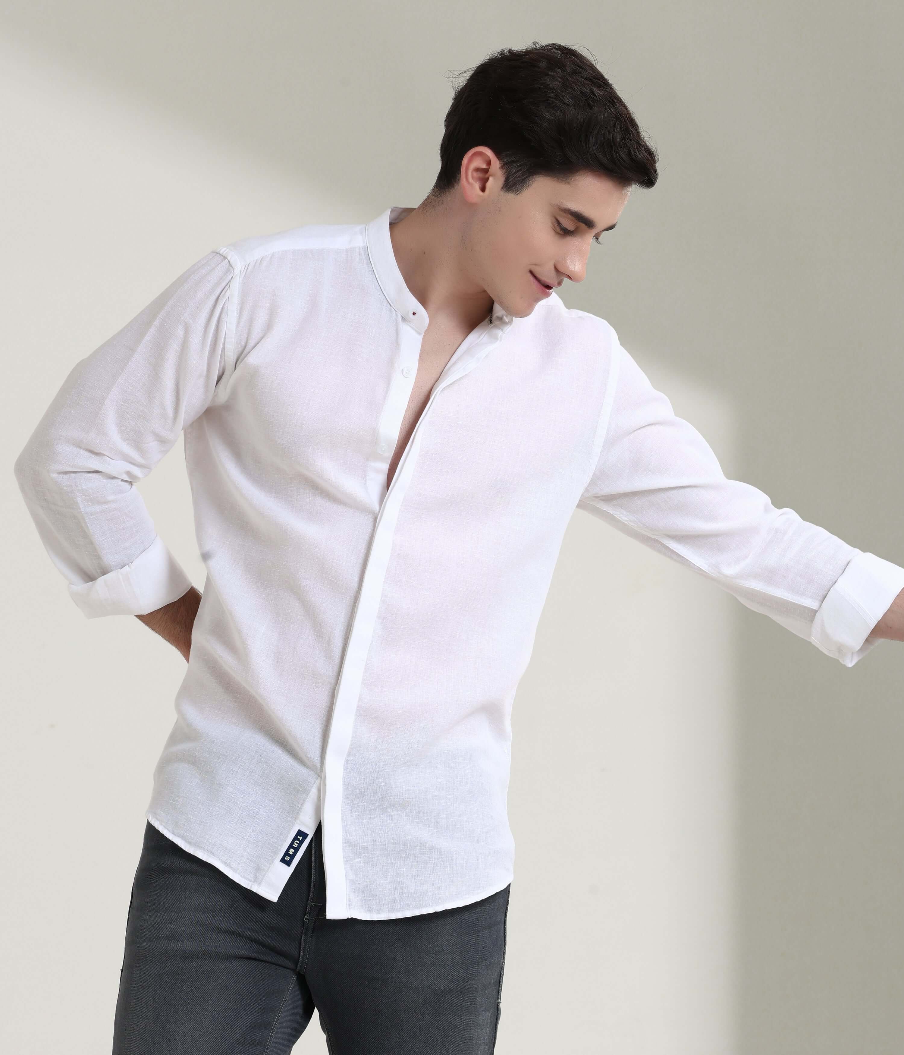 Stylish man wearing a white linen shirt with a mandarin collar, featuring anti-stain and anti-odour technology for intelligent apparel.