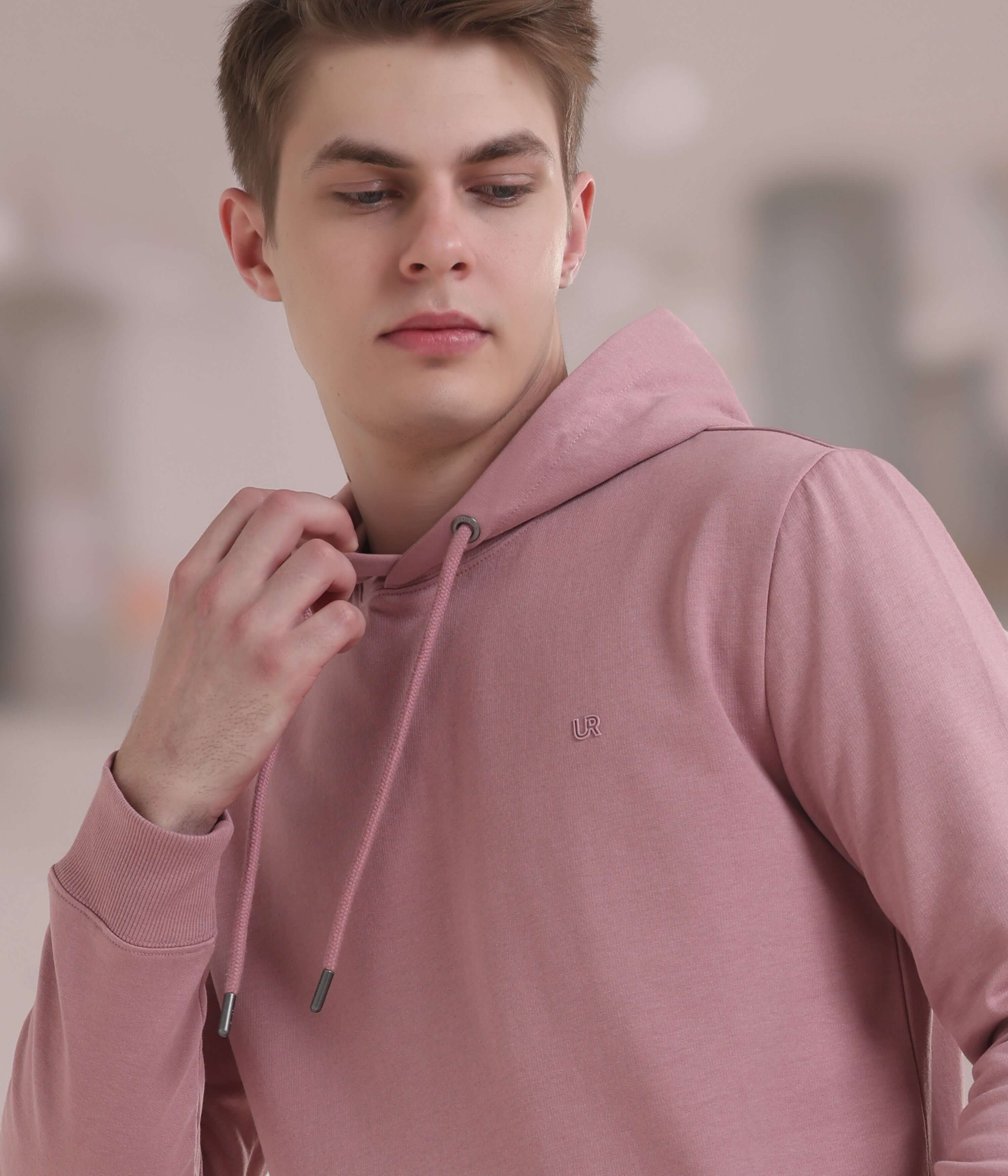 Stylish pink hooded sweatshirt for men, featuring premium fabric and innovative waterproof, stain-proof design.