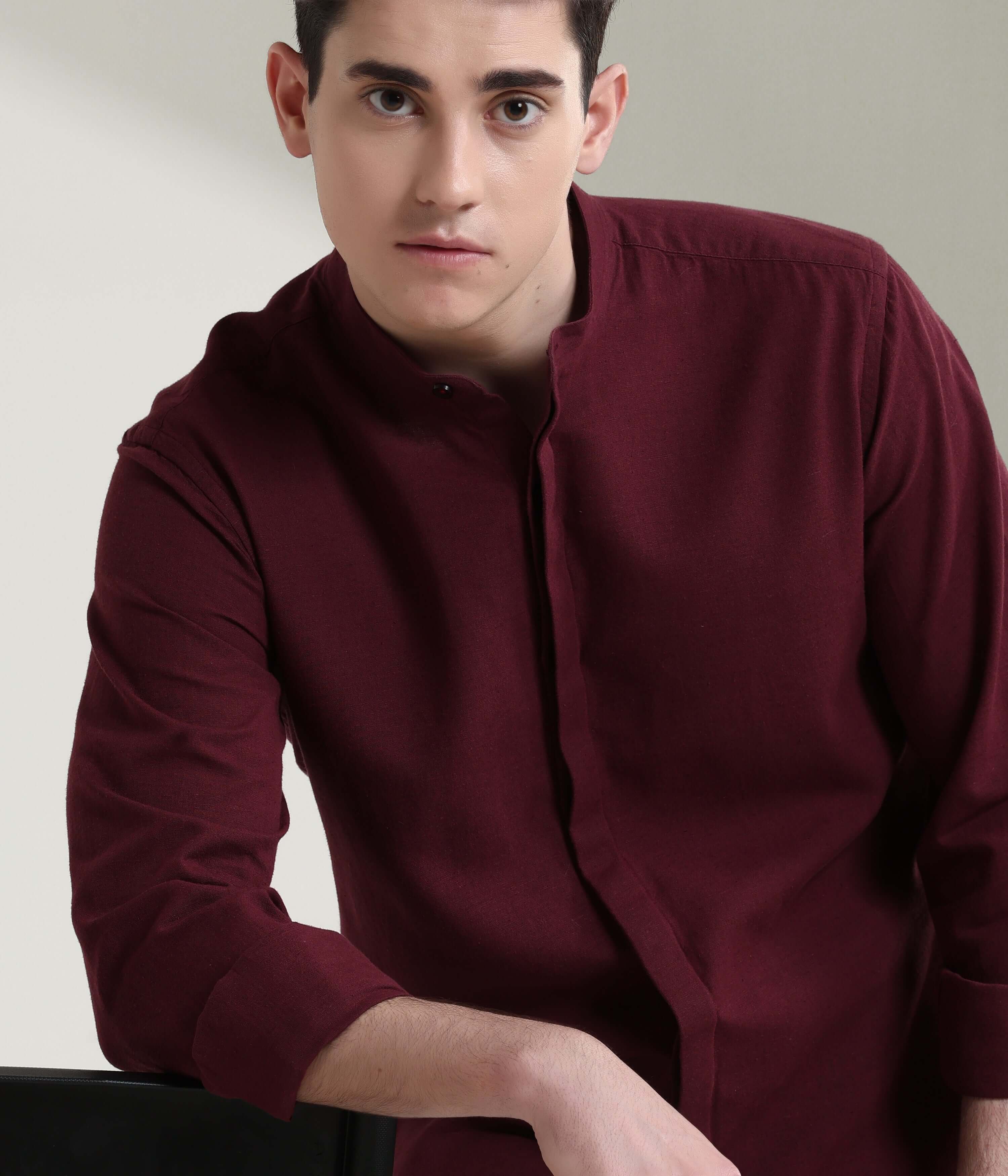 Man wearing maroon cotton/linen mandarin collar shirt, showcasing anti-stain, anti-odour Turms intelligent apparel.