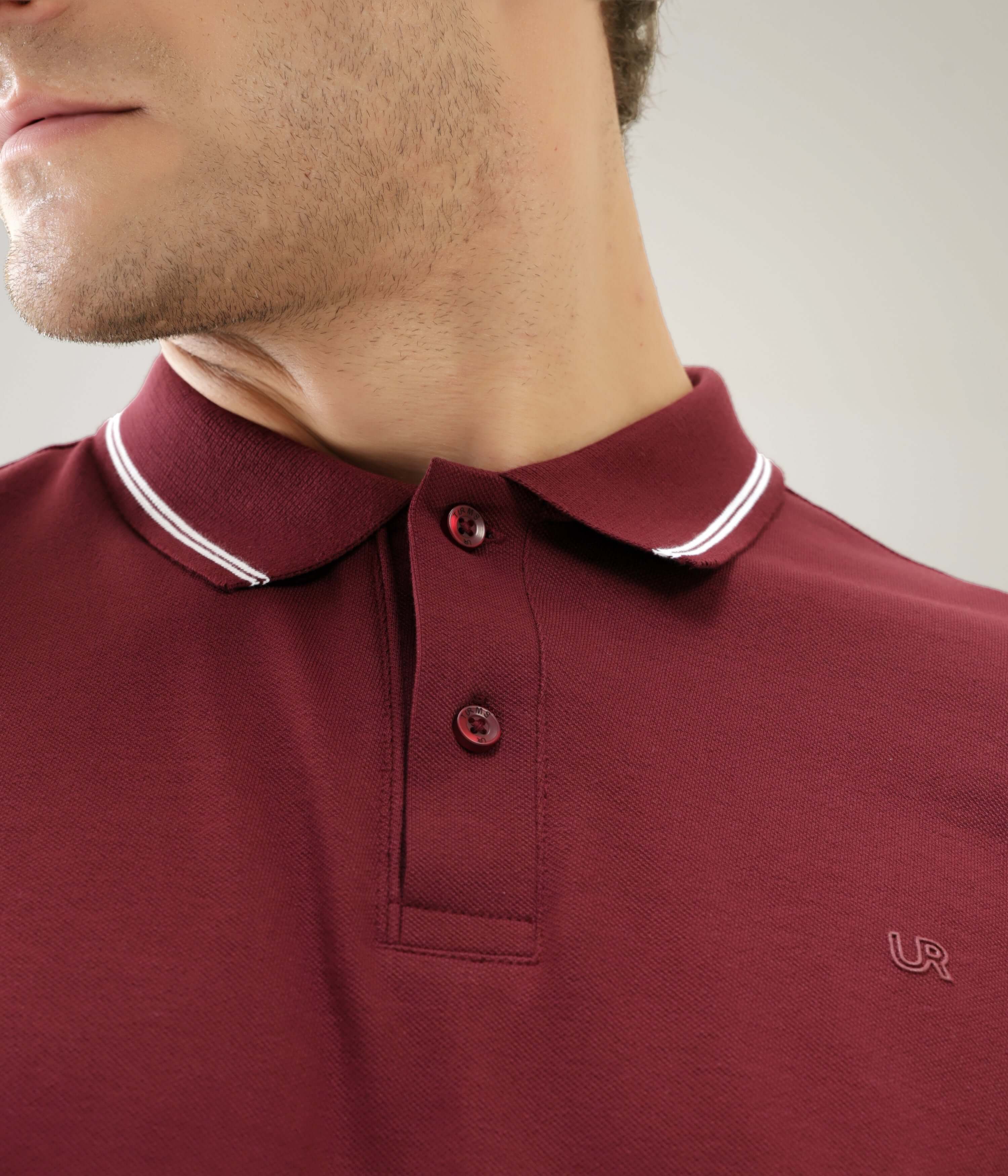 Man wearing stain-proof and odor-resistant Turms Polo T-shirt in wine color, made of 95% premium cotton and 5% lycra, tailored fit.