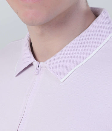 Lavender Breeze polo shirt detail featuring zipped collar, breathable fabric and lightweight design.