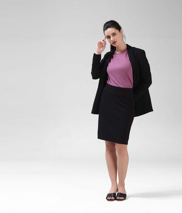 Woman wearing Dusty Rose Turms COOLTECH T-shirt with blazer and skirt, showcasing intelligent apparel with anti-odour honeycomb fabric and new colour.