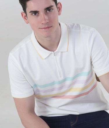 Model wearing a white zipped polo shirt with pastel stripes, showcasing style and comfort.