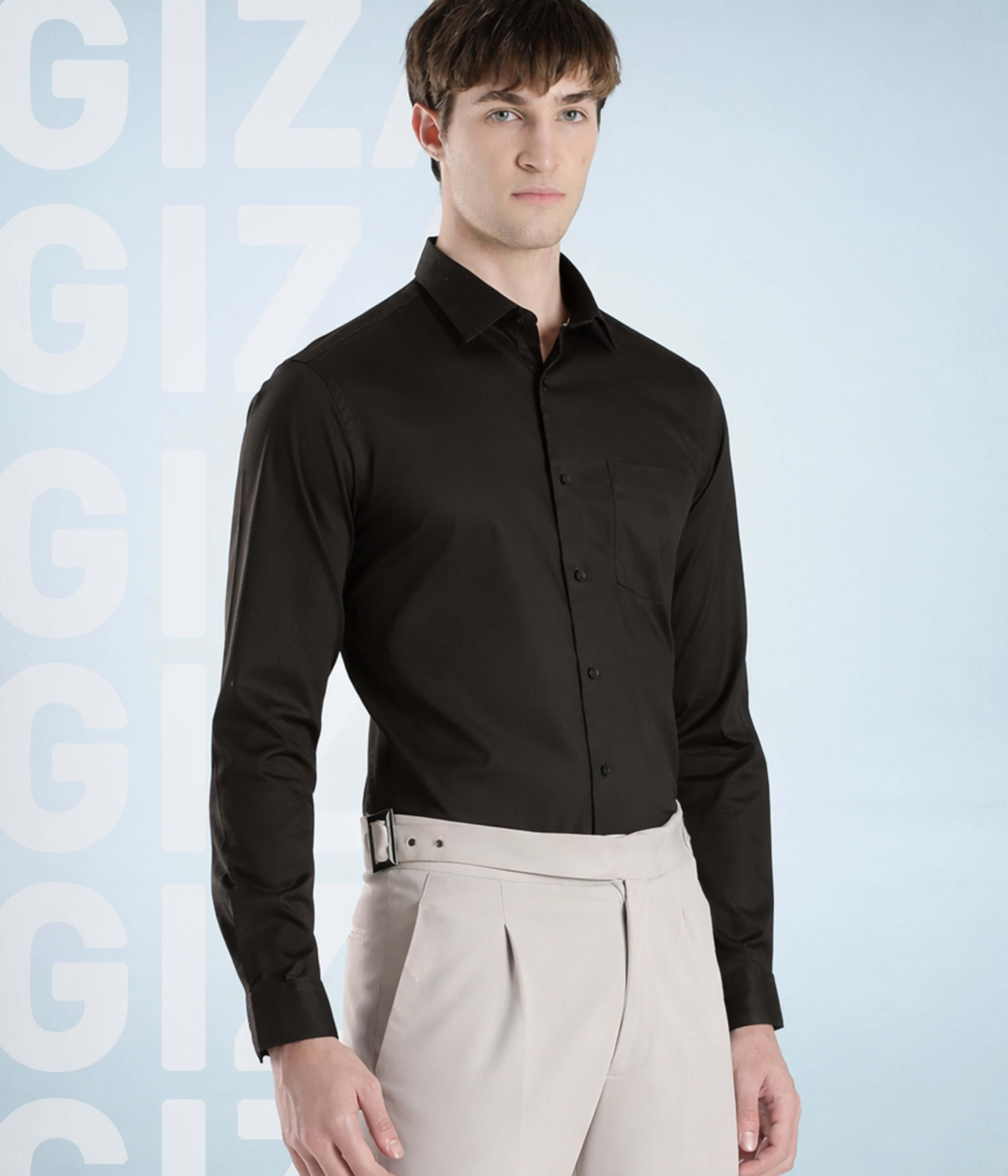 Olive Empire: Model wearing a black Turms Intelligent Giza cotton shirt, showcasing premium style and quality.