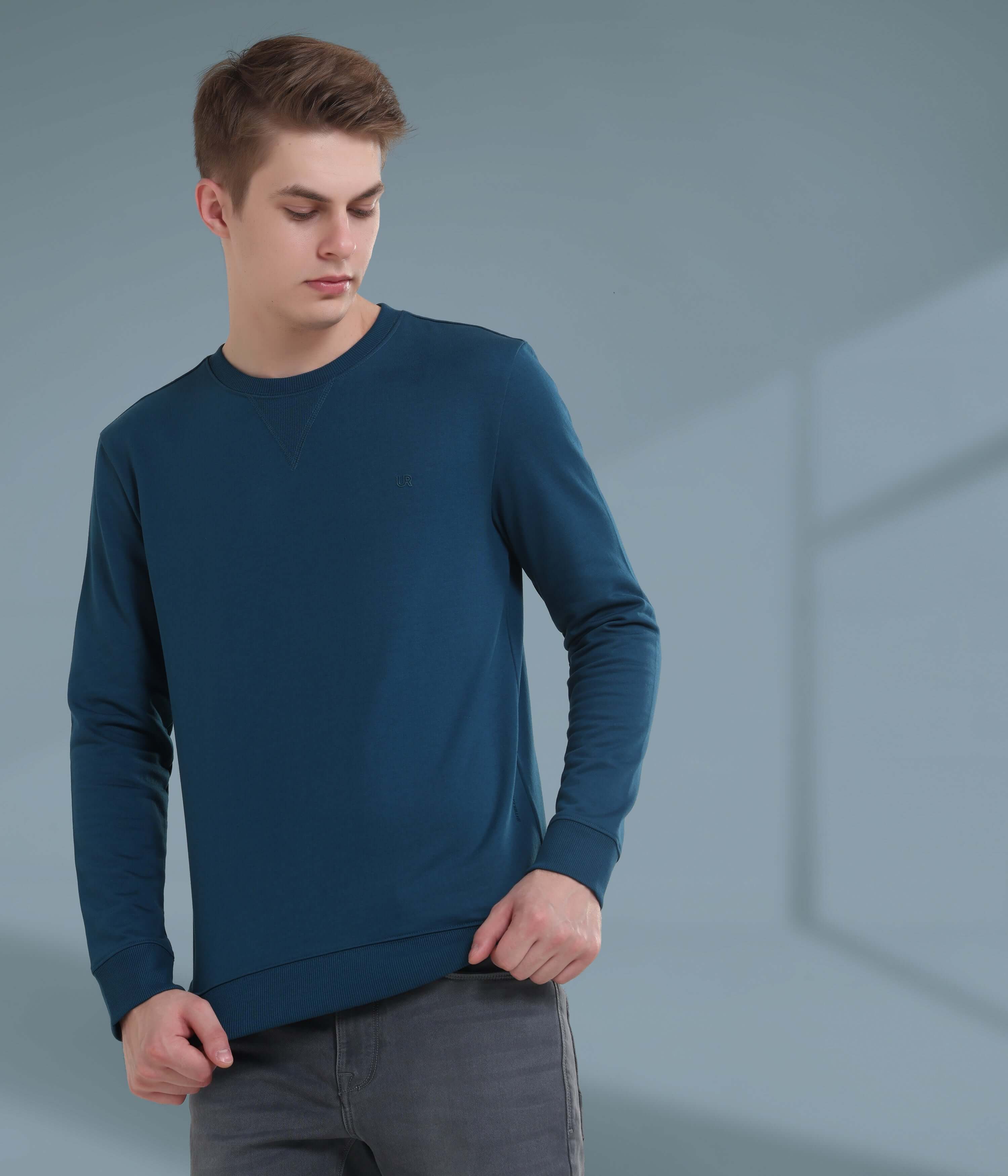 Stylish blue sweatshirt for men, crafted from premium fabric for comfort and durability, perfect for everyday wear.