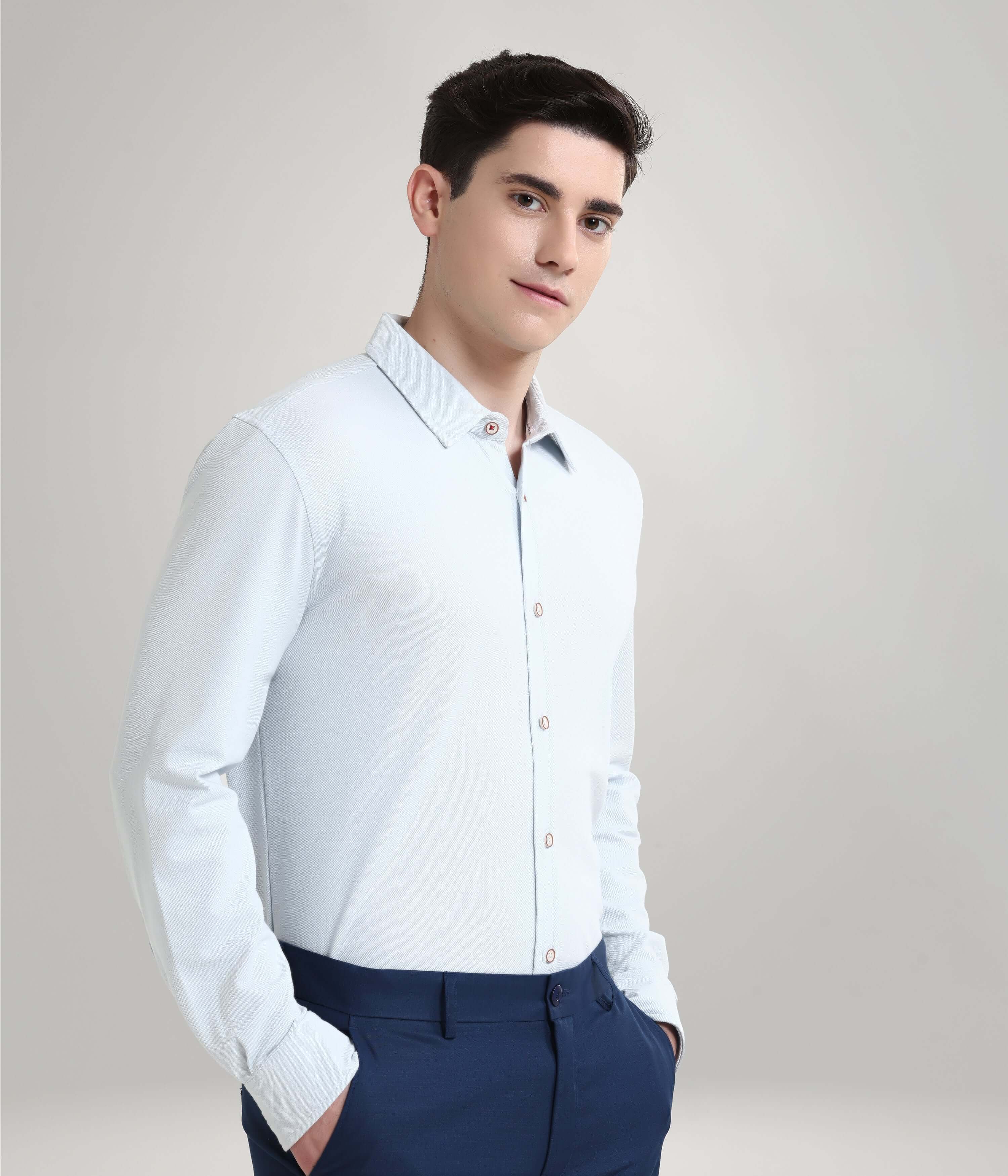 Man wearing Ethereal Blue Knitted Turms Stretchable Shirt, premium style, anti-stain, anti-odor, stripe design, best menswear shirt.