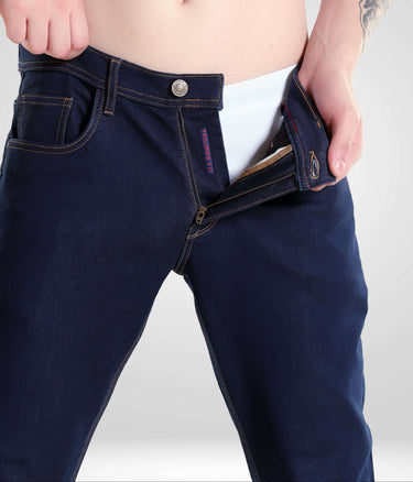 Man wearing Indigo Trotter high-performance denim pants by Turms Intelligent Apparel, showcasing premium men's fashion.