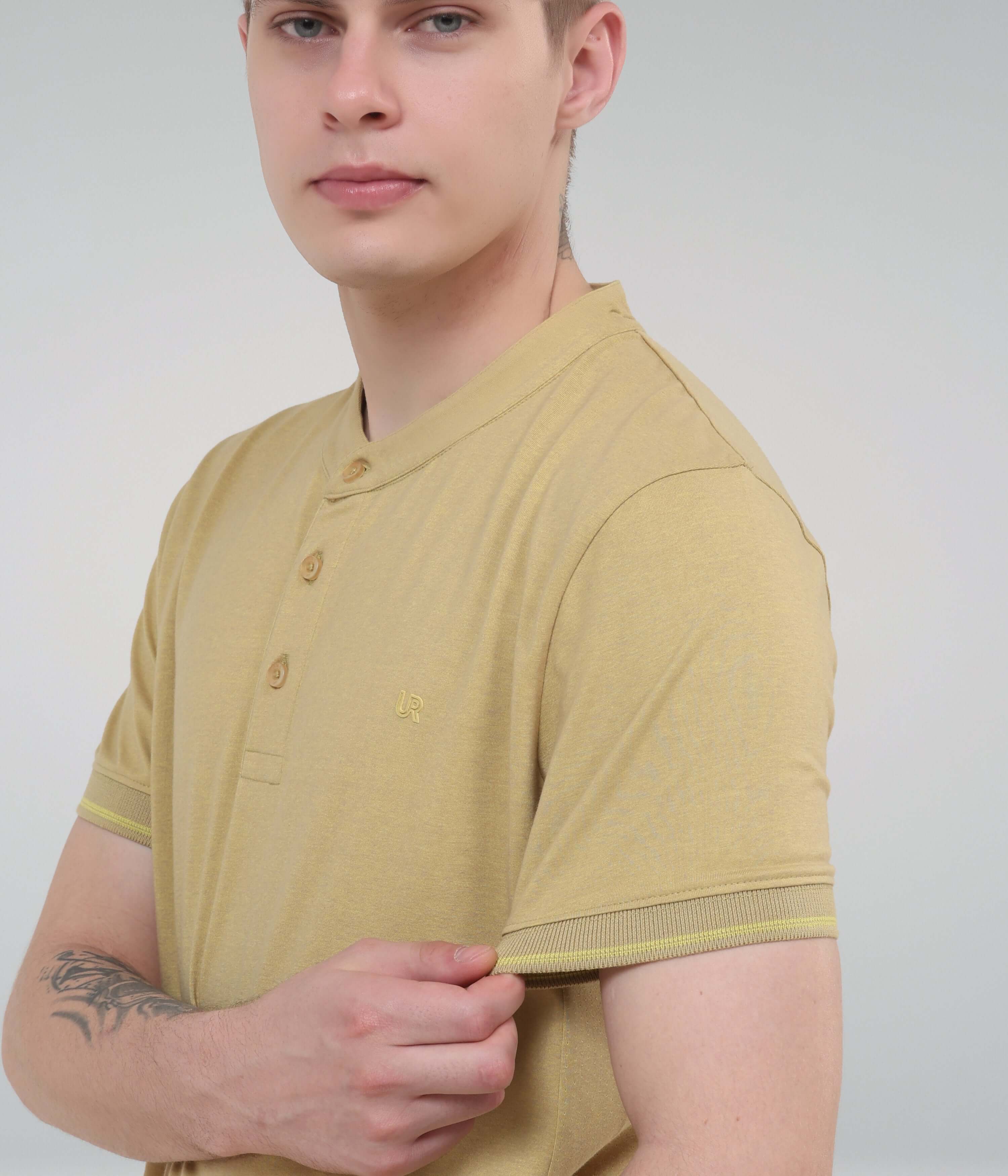 Men's Mountain Beige Turms Intelligent Henley T-Shirt with moisture control and anti-odour technology.